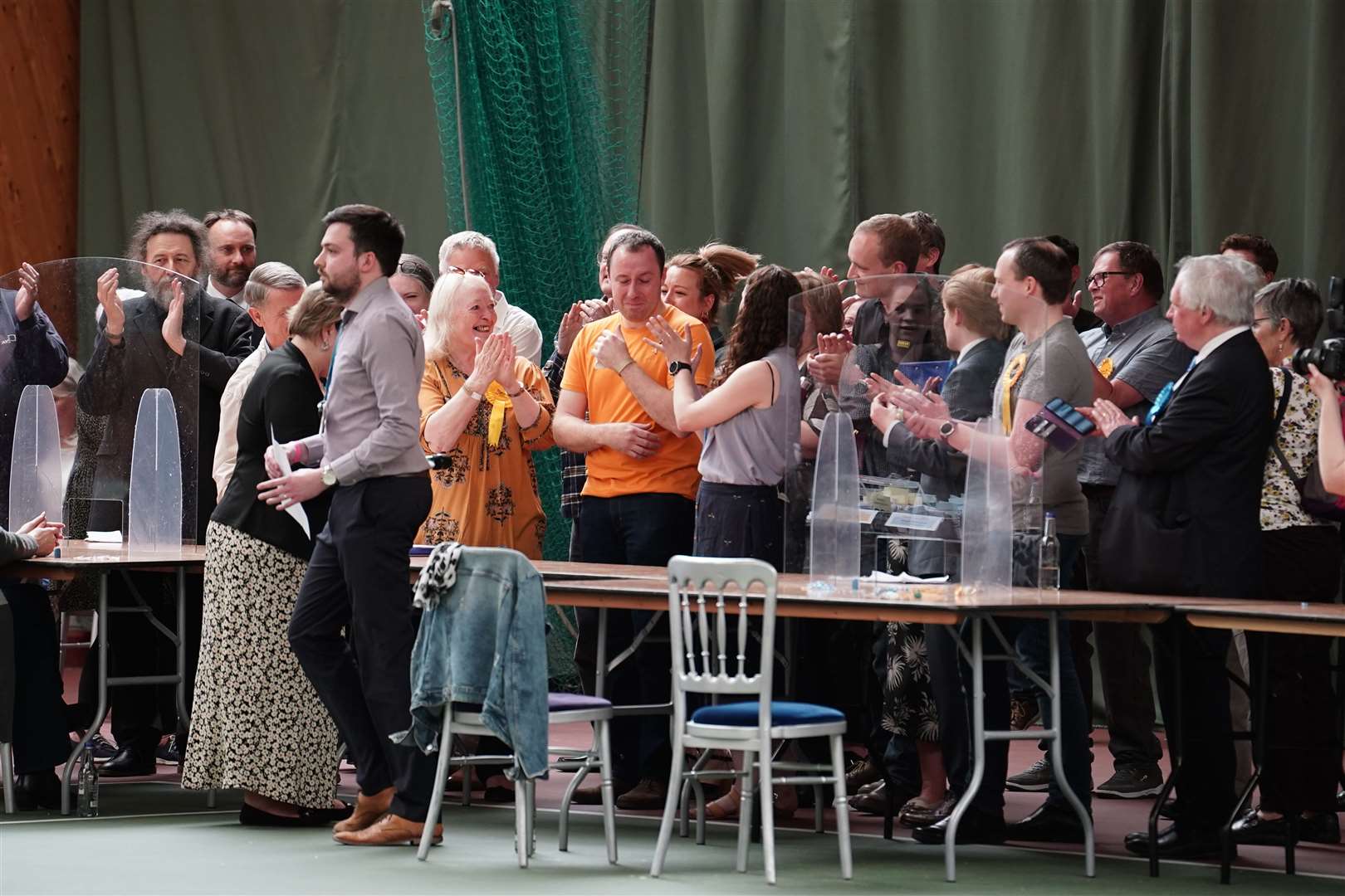 An emotional Kerry Morrow (in the orange t-shirt) wins the Tadley North, Kingsclere and Baughurst seat for the Lib Dems
