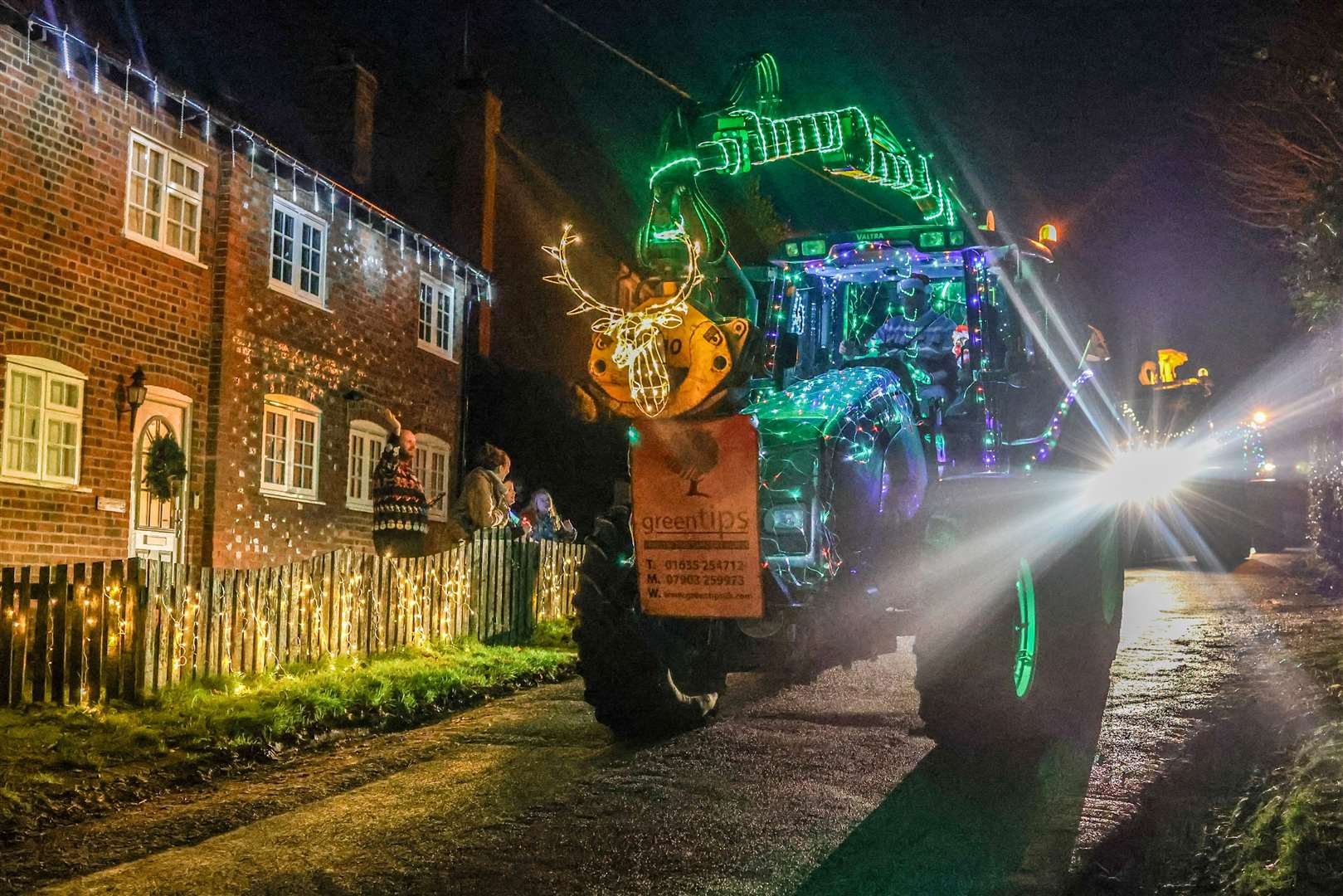 Woolton Hill Christmas Tractor Run coming along Tubbs Lane in Highclere