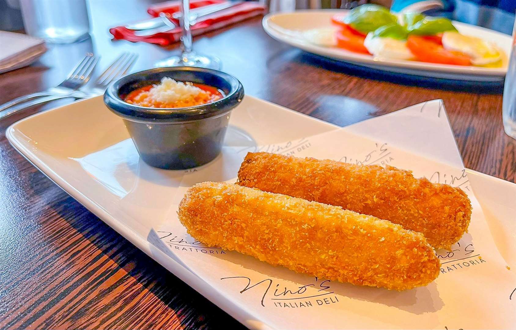 Mozzarella in Carrozza (£8.80), bread-crumbed buffalo mozzarella lightly fried and served with a tomato sauce