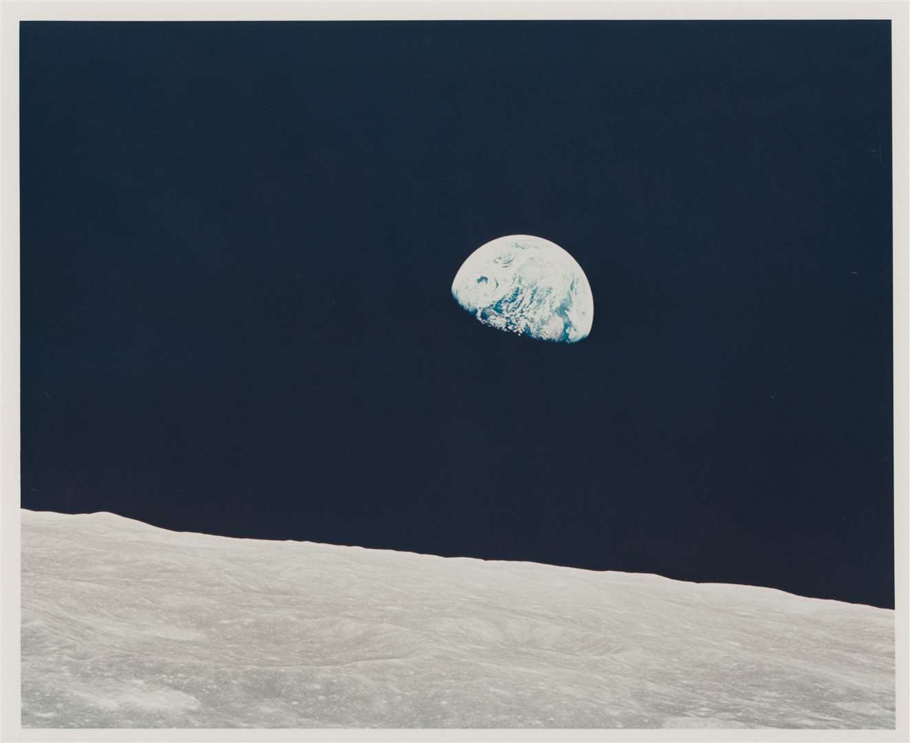 Earthrise by William Anders, 1968. Estimate £4,000-£6,000 (lot 145)