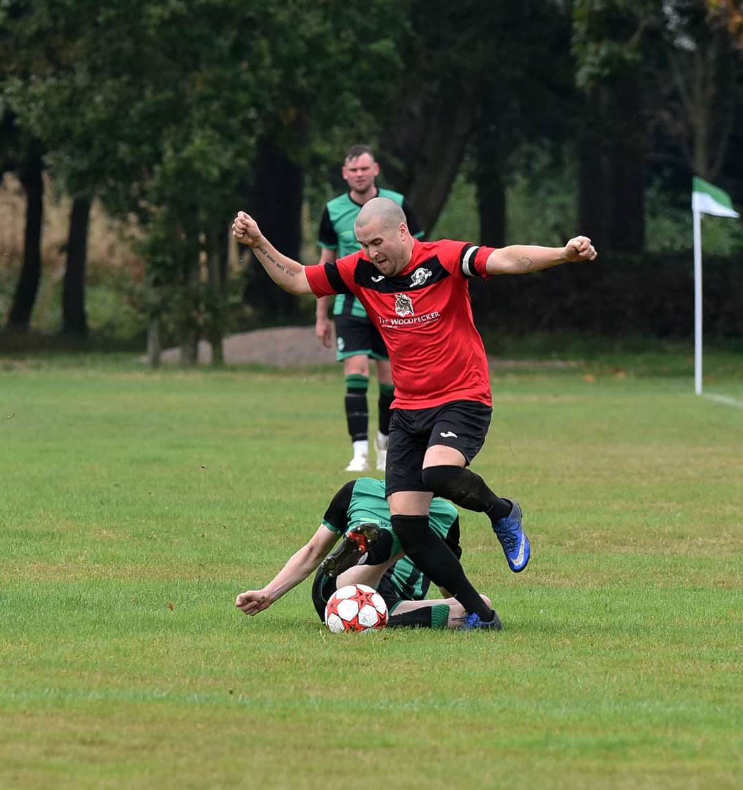 Players fight for the ball