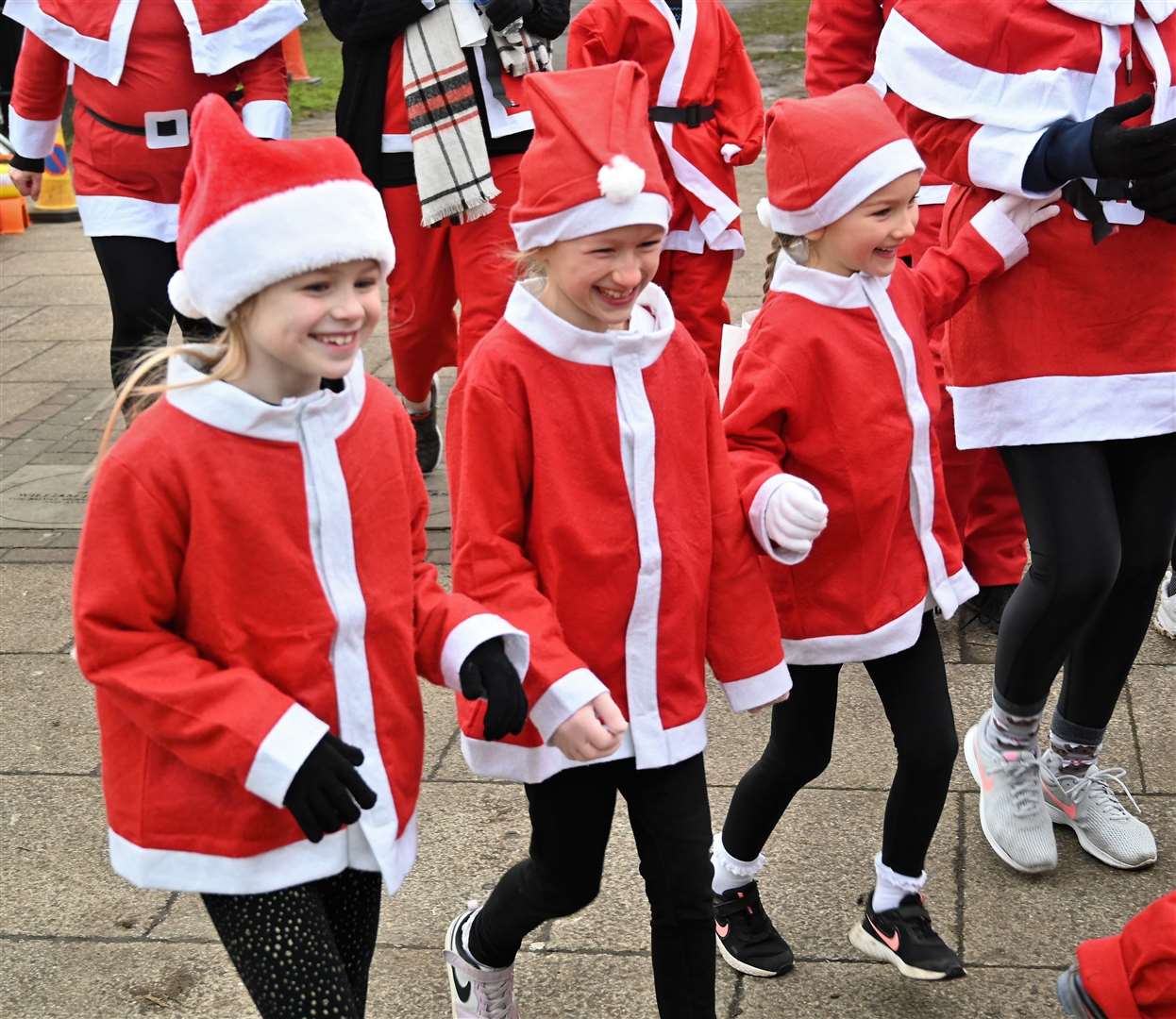Three little Santa's.