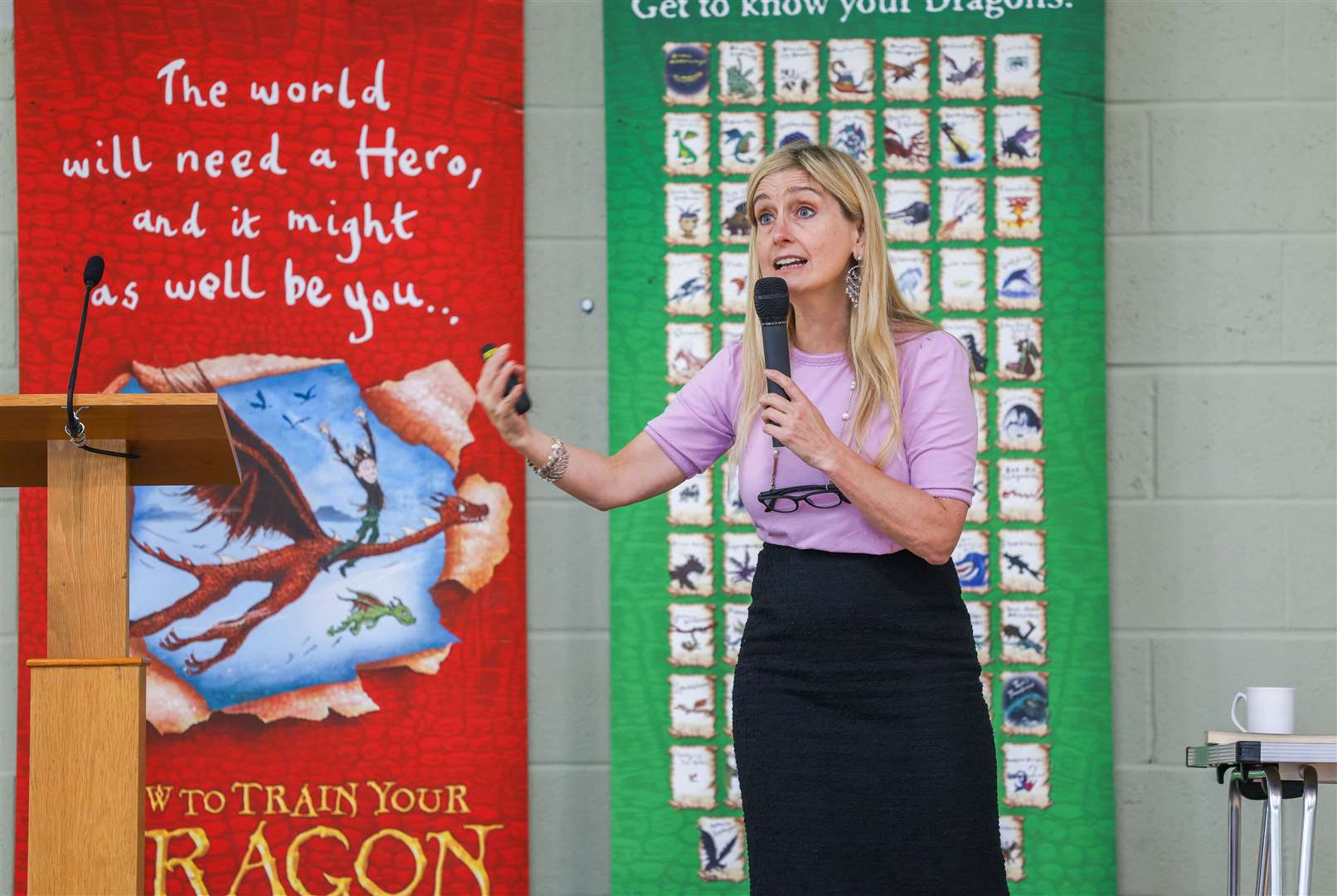 Cressida Cowell, author and the illustrator of the bestselling How to Train Your Dragon book series, gives a talk to 500 primary school pupils in West Berkshire
