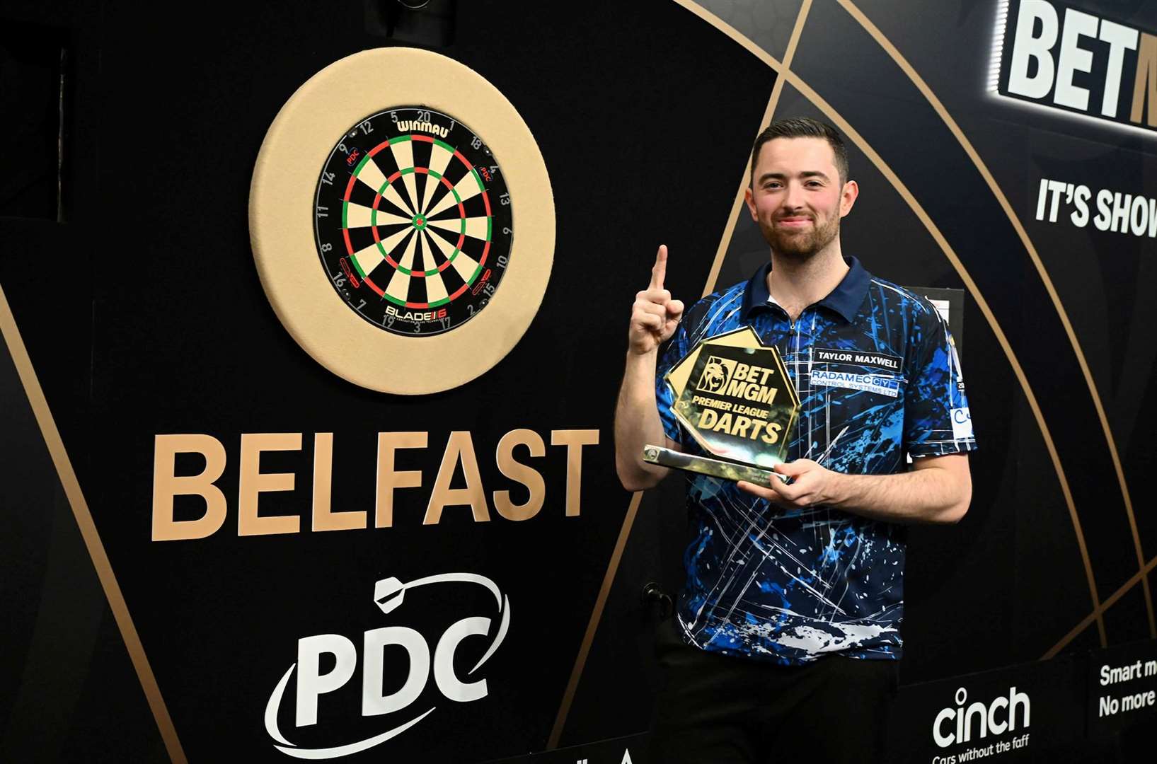 Luke Humphries beat Chris Dobey to make a perfect start to the 2025 Premier League - Photo: Michael Cooper/PDC