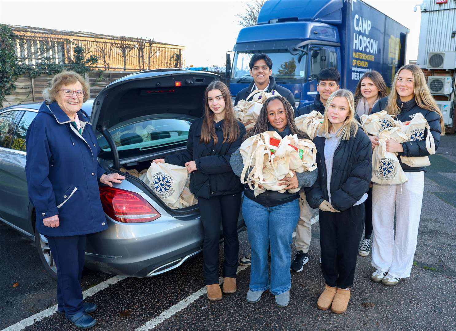 Collecting parcels to be delivered in Chieveley, with help from St Bart’s students