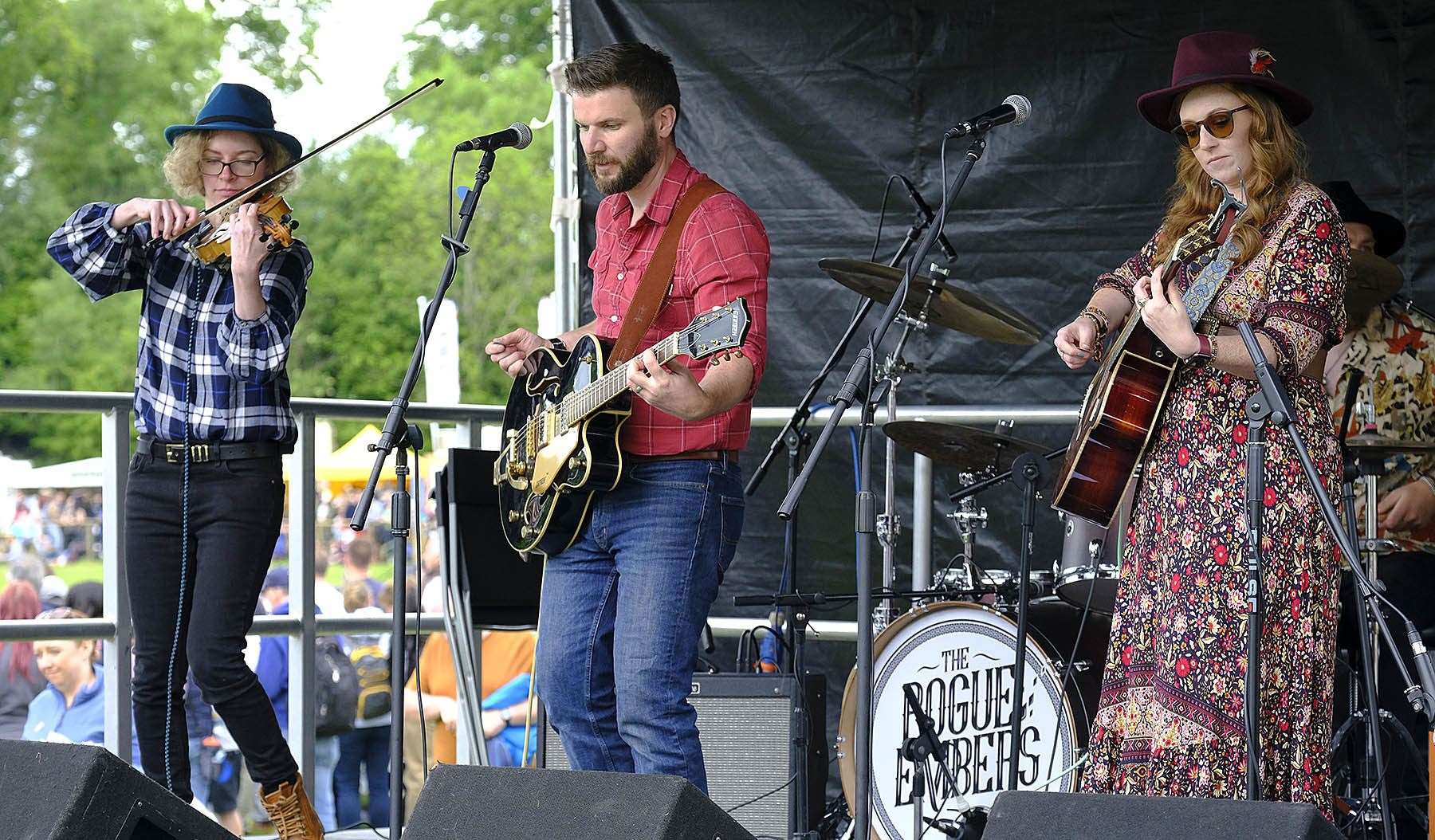 The Rogue Embers perform on the folk stage