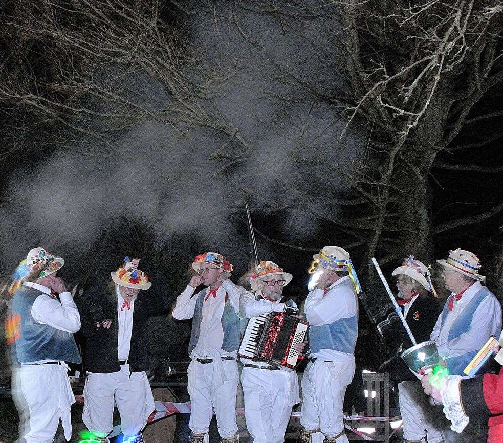 Morris dancers resort to fingers in the ears as the muzzleloaders fire their volley Picture Geoff Fletcher