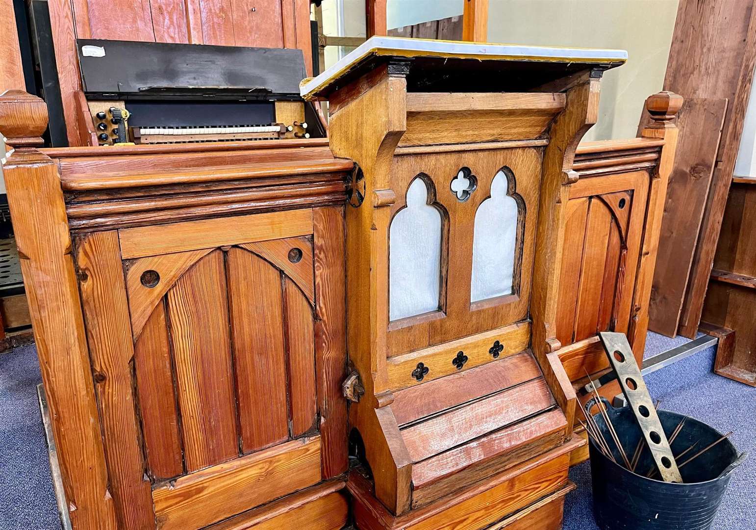 The centre of the pulpit is original, while the sides were added later