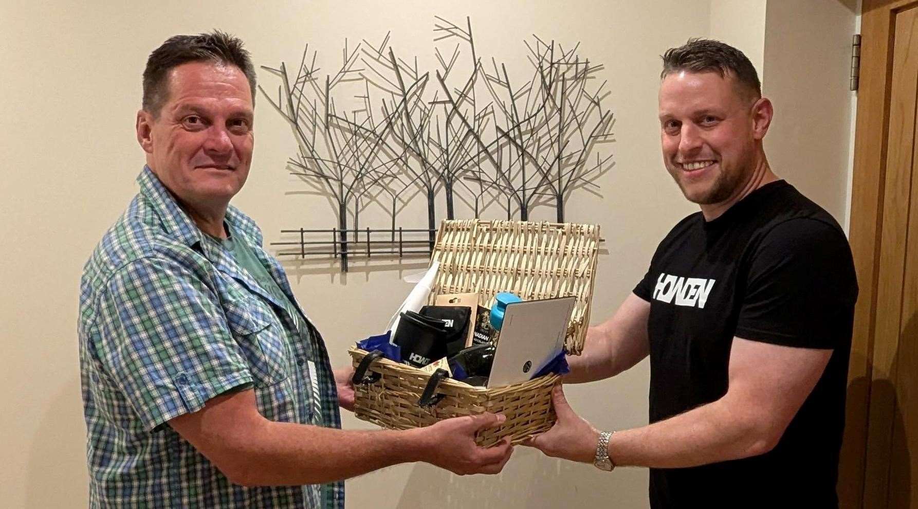 Howden Thatcham Branch Manager Luke Mason with winning client Christopher James