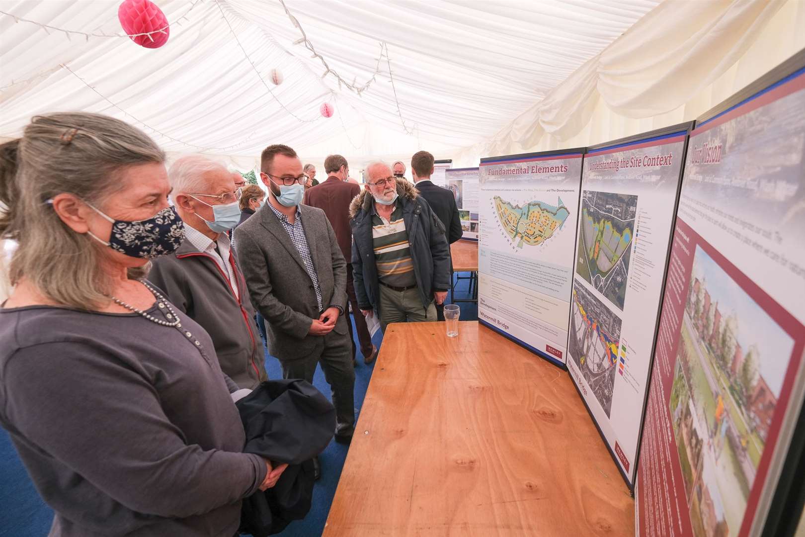 Residents look at the new housing estate plans in Wash Water.Ref: 36-0221. (50918246)