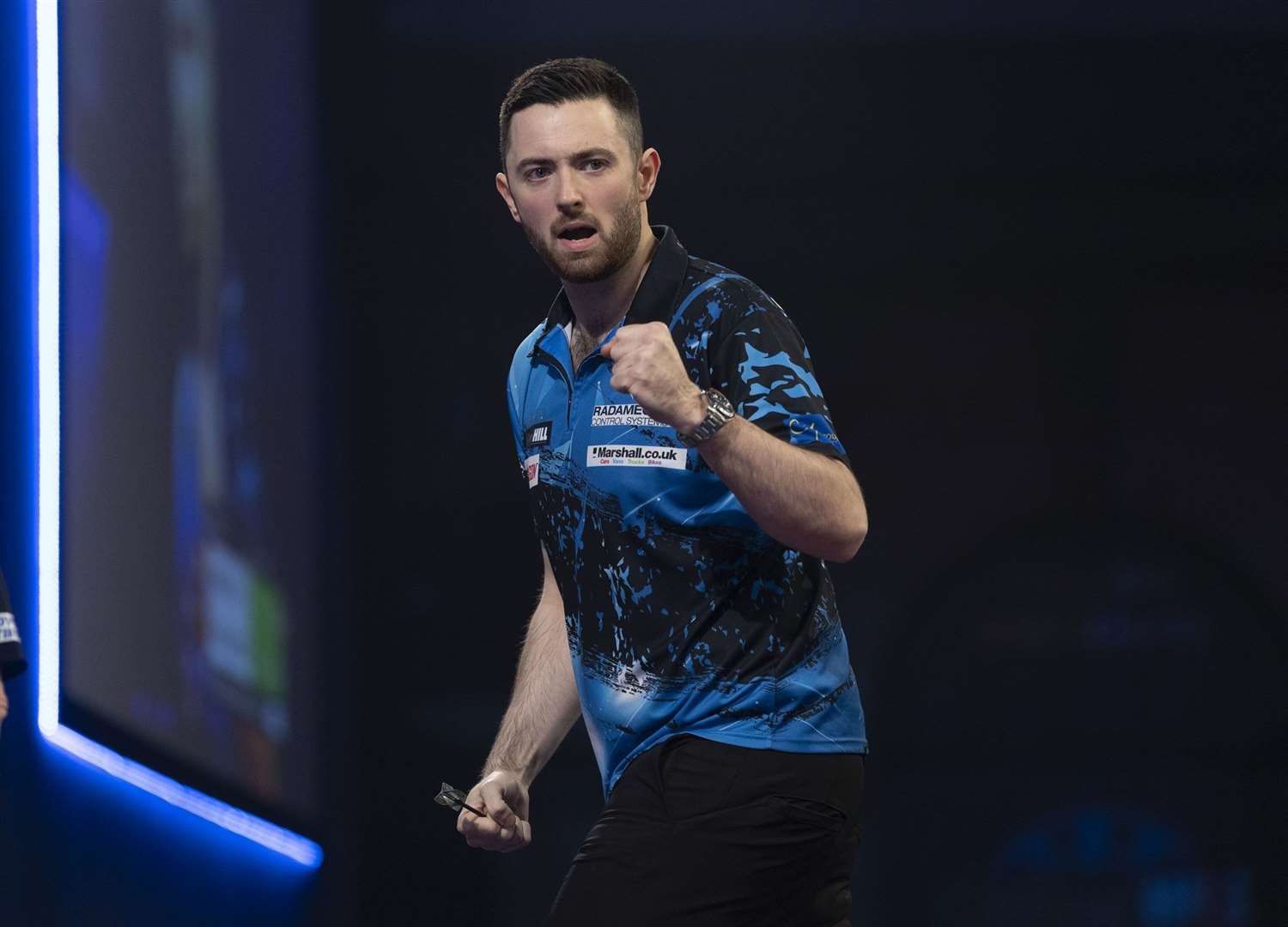 Luke celebrates after reaching the third round Pic: Lawrence Lustig/PDC