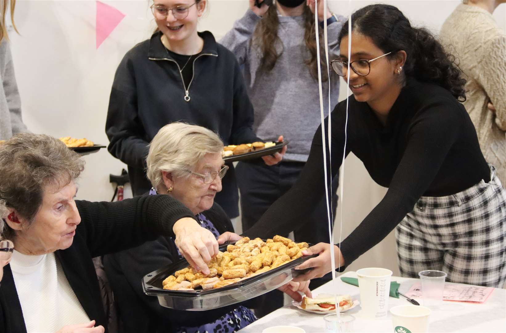 Senior residents enjoy coffee morning with Little Heath pupils