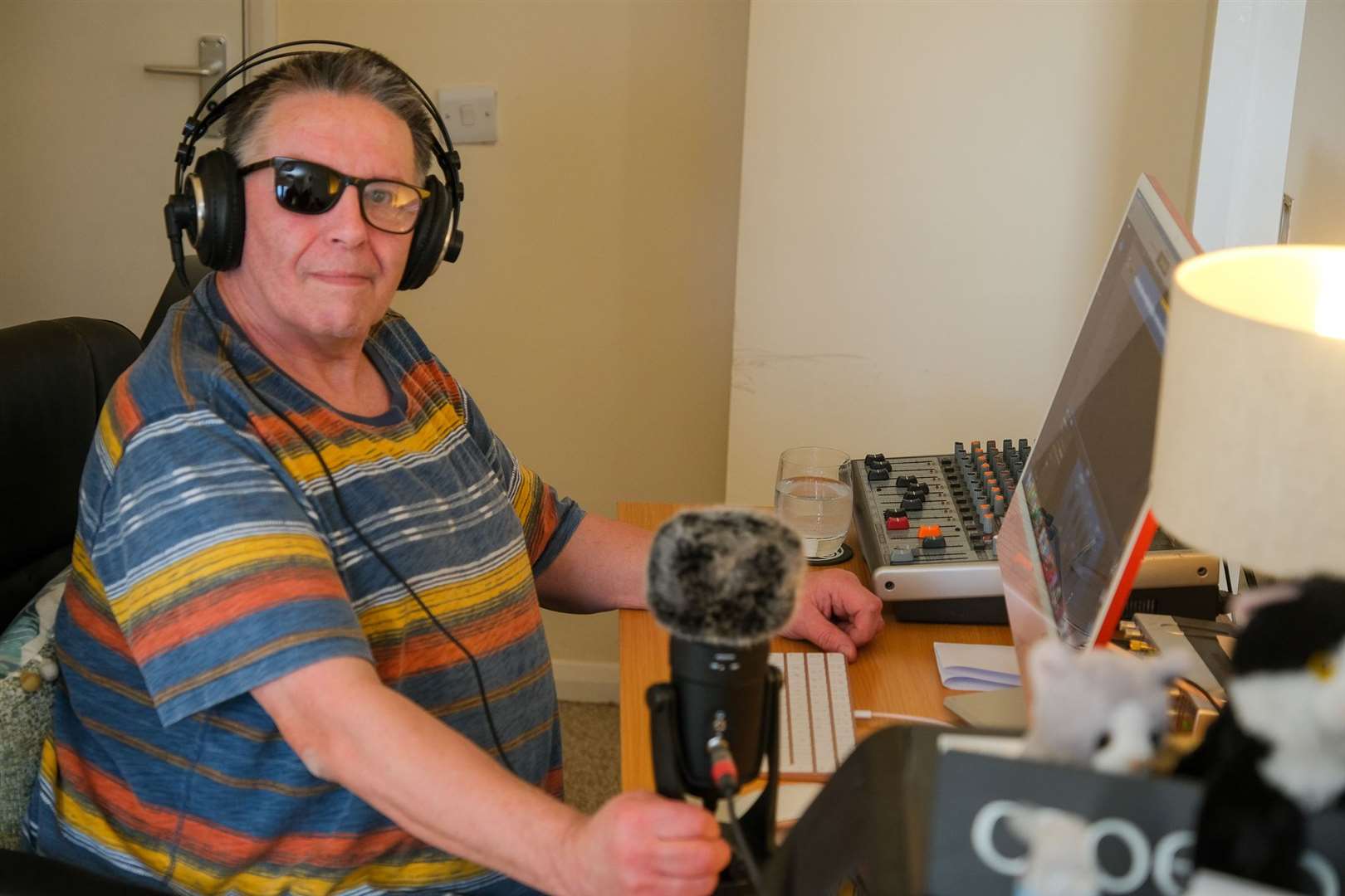 Podcaster Paul Allen in his home studio
