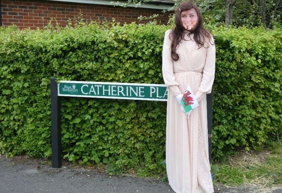 Various handmade royal scarecrows dotted around the village