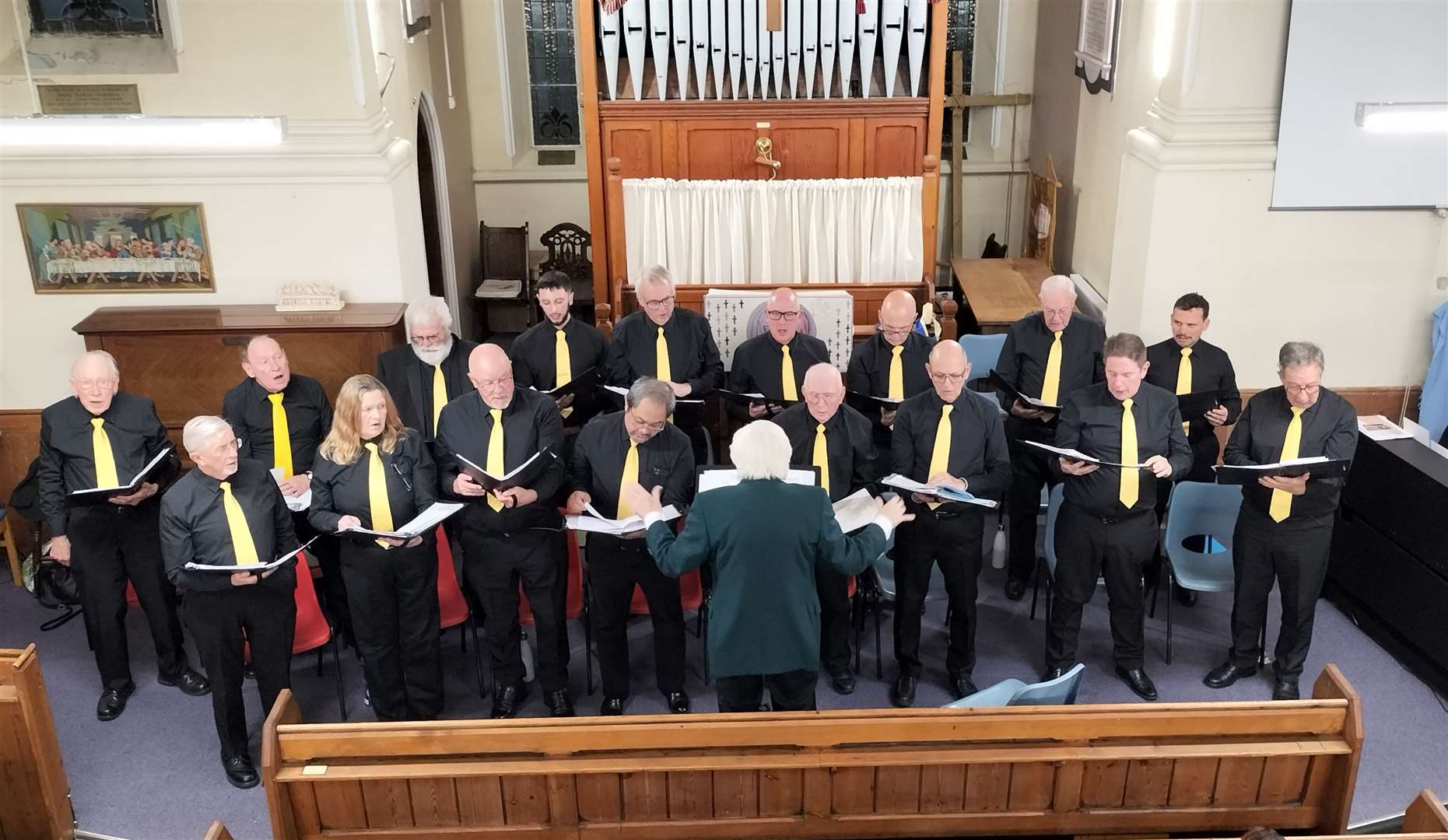 Basingstoke Hospital Male Voice Choir performing inside the church