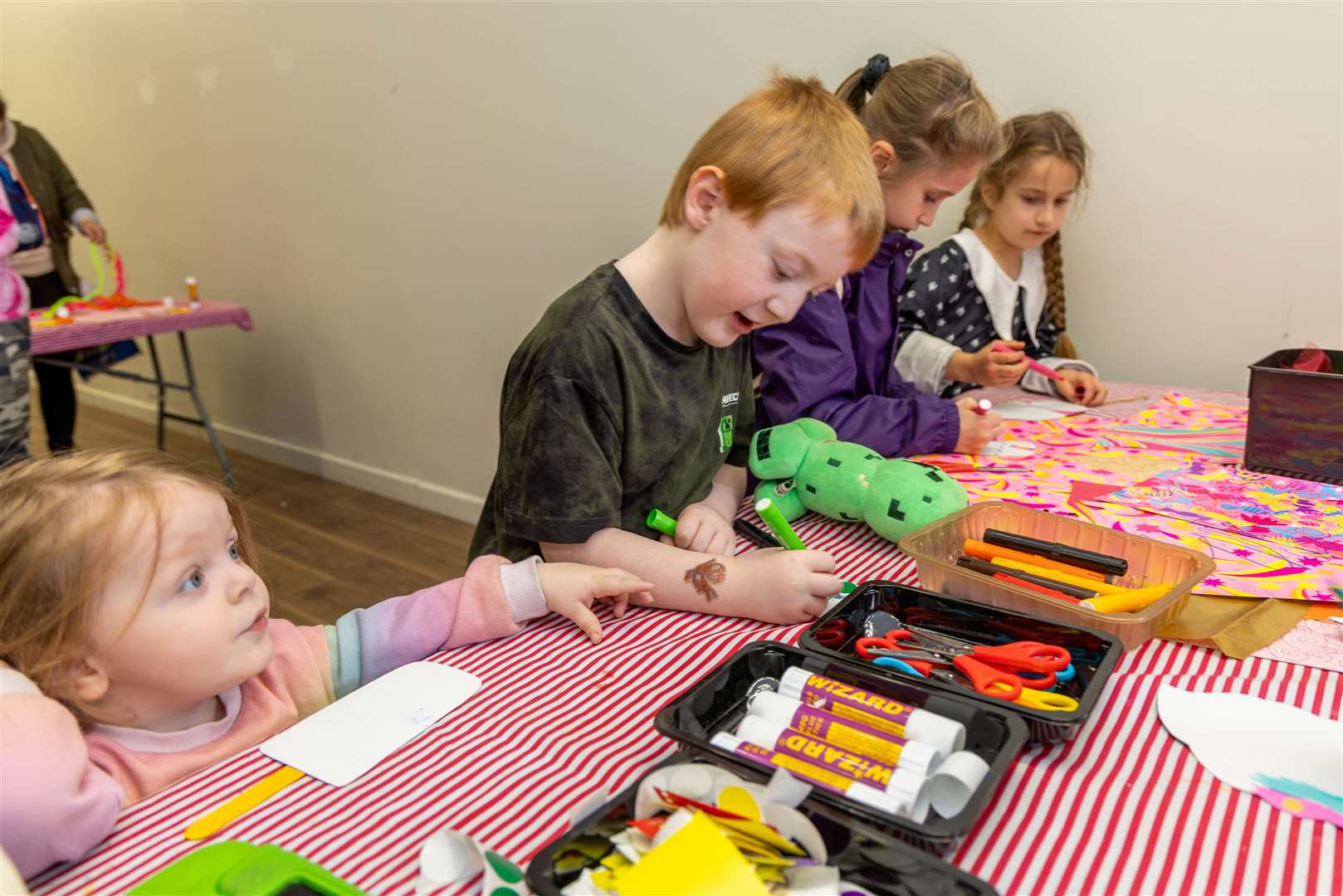 Children taking part in the craft workshop