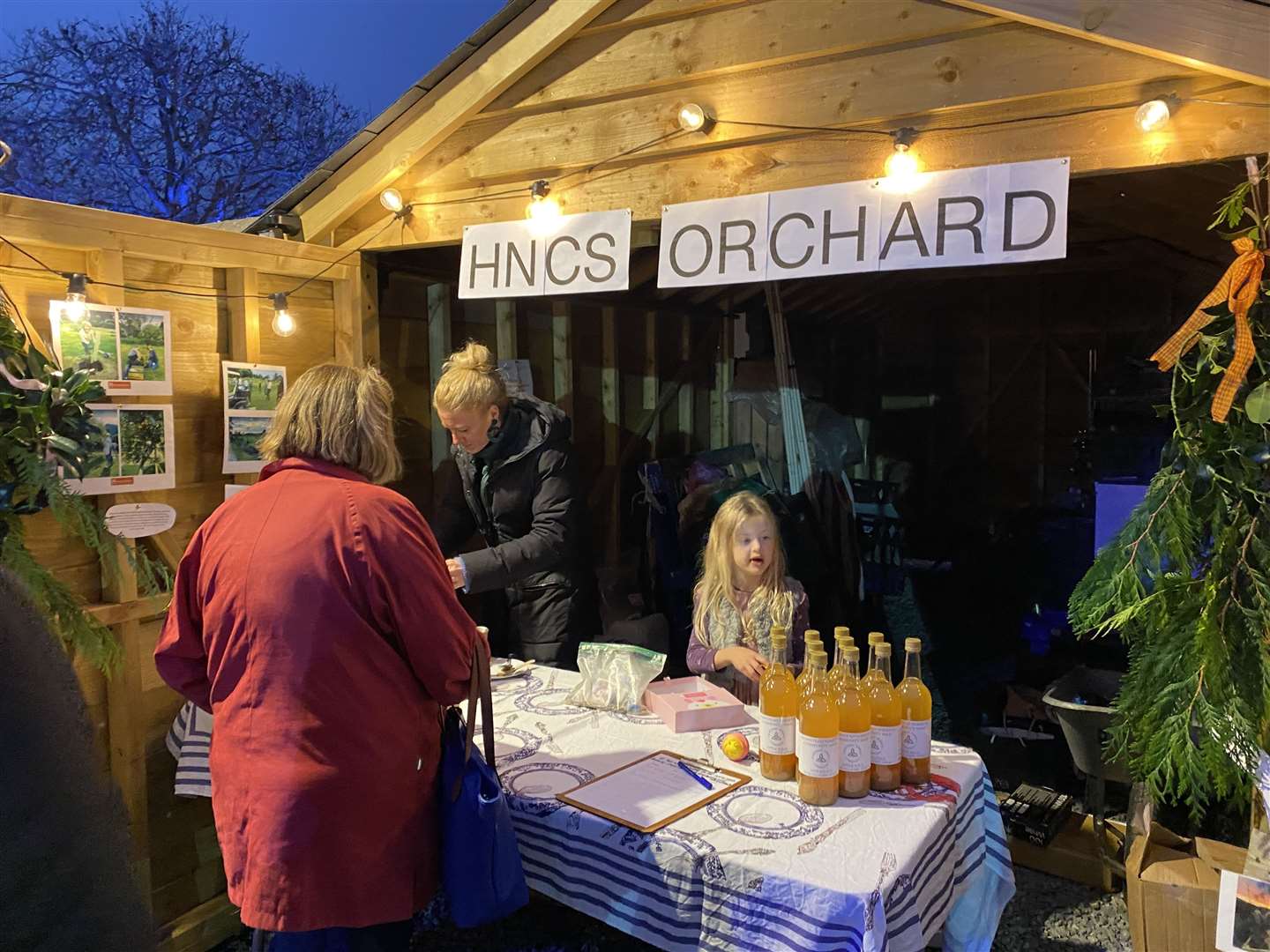 Mulled apple juice from apples picked locally by villagers. Stall run by the shop orchard team who have planted and care for a large number of heritage fruit trees