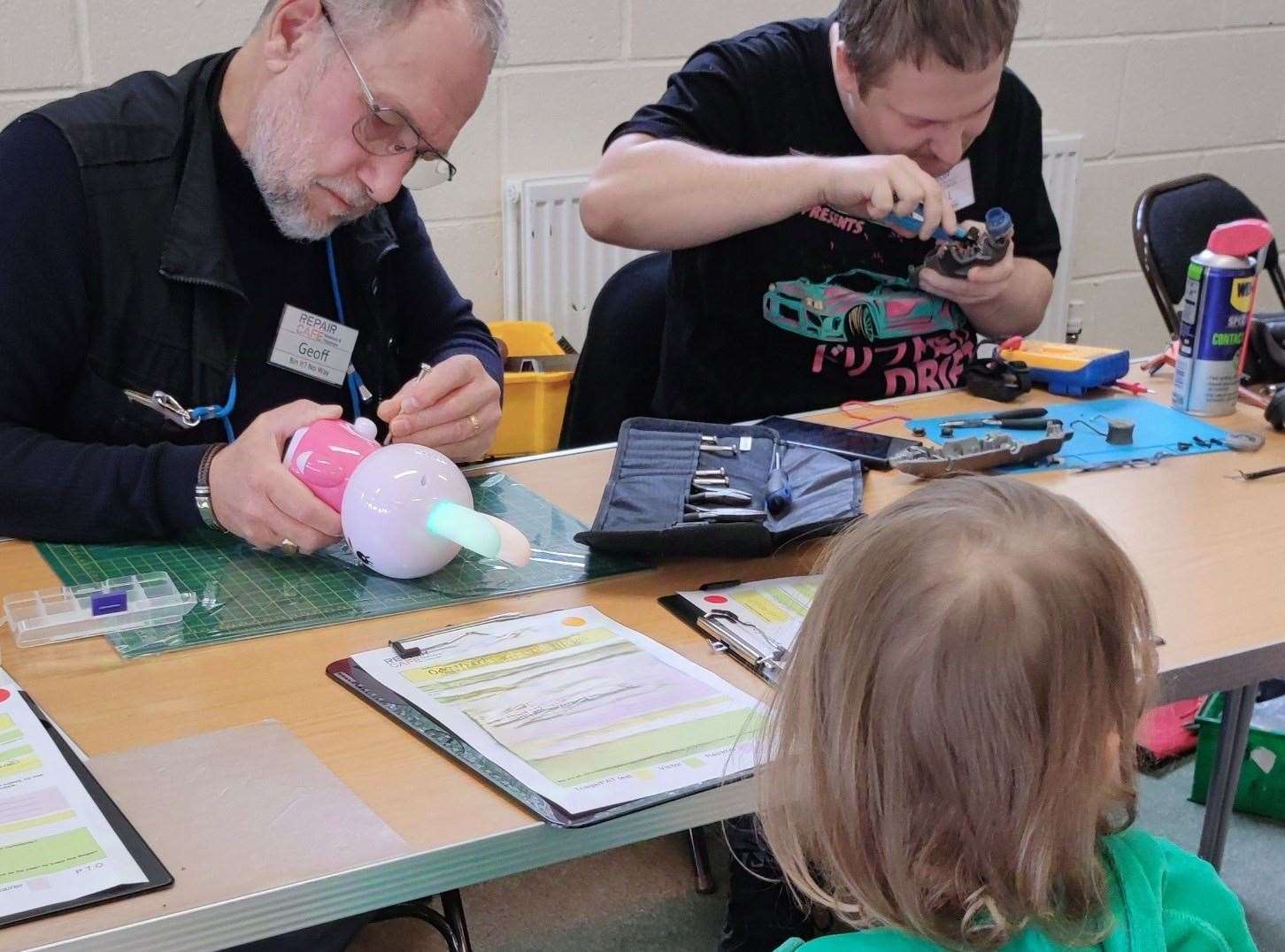 Volunteers working in the Repair Cafe