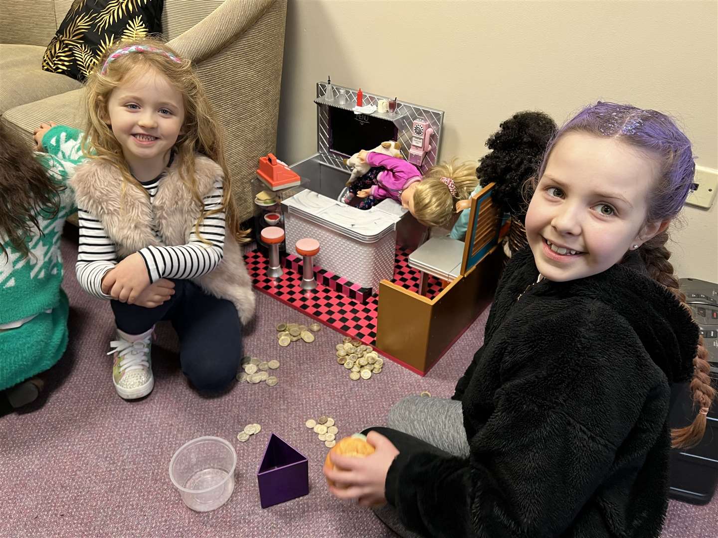 Some Falkland ambassadors counting the money raised