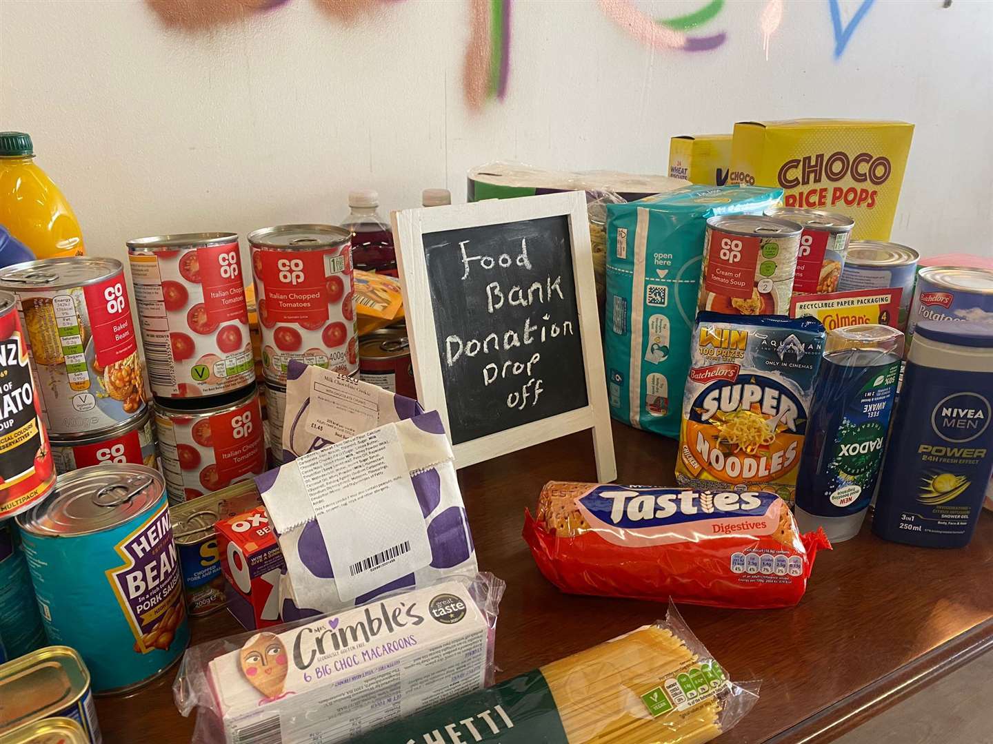 The café has a foodbank donation table