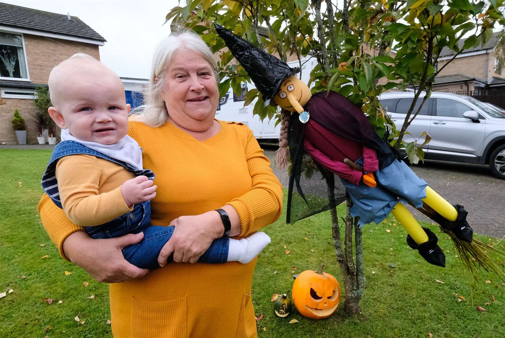Brenda Login with one-year-old grandson Theodore.