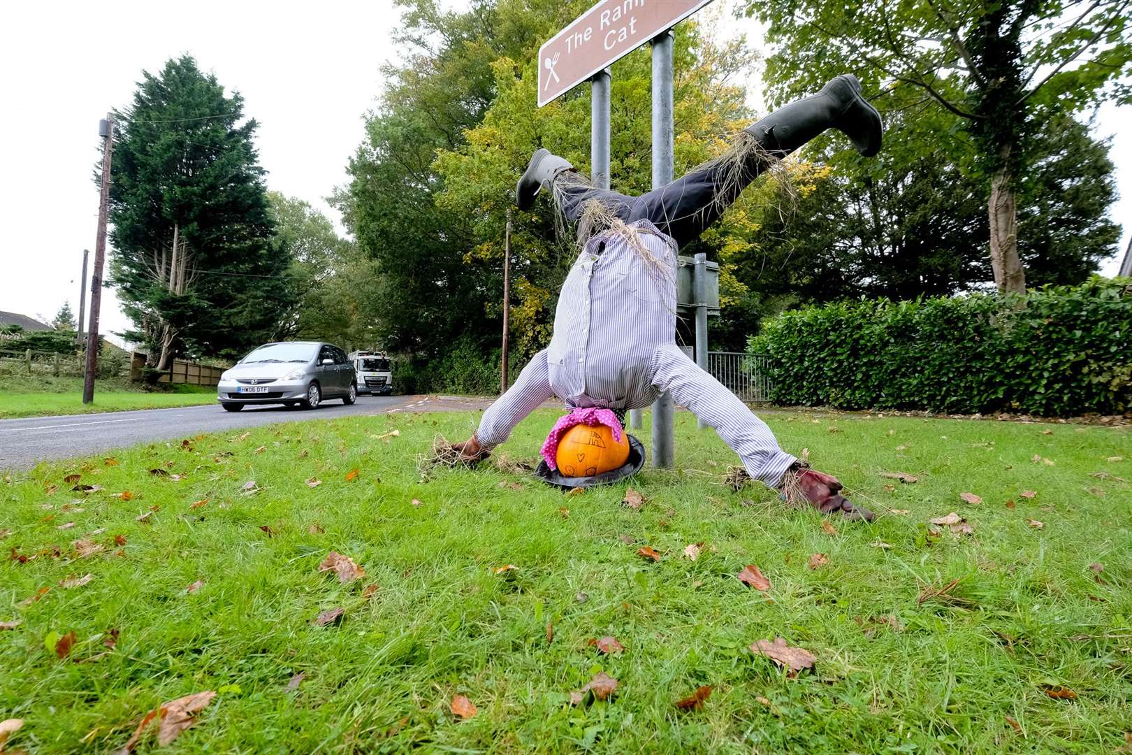Doing cartwheels at the entrance to Woolton Hill.