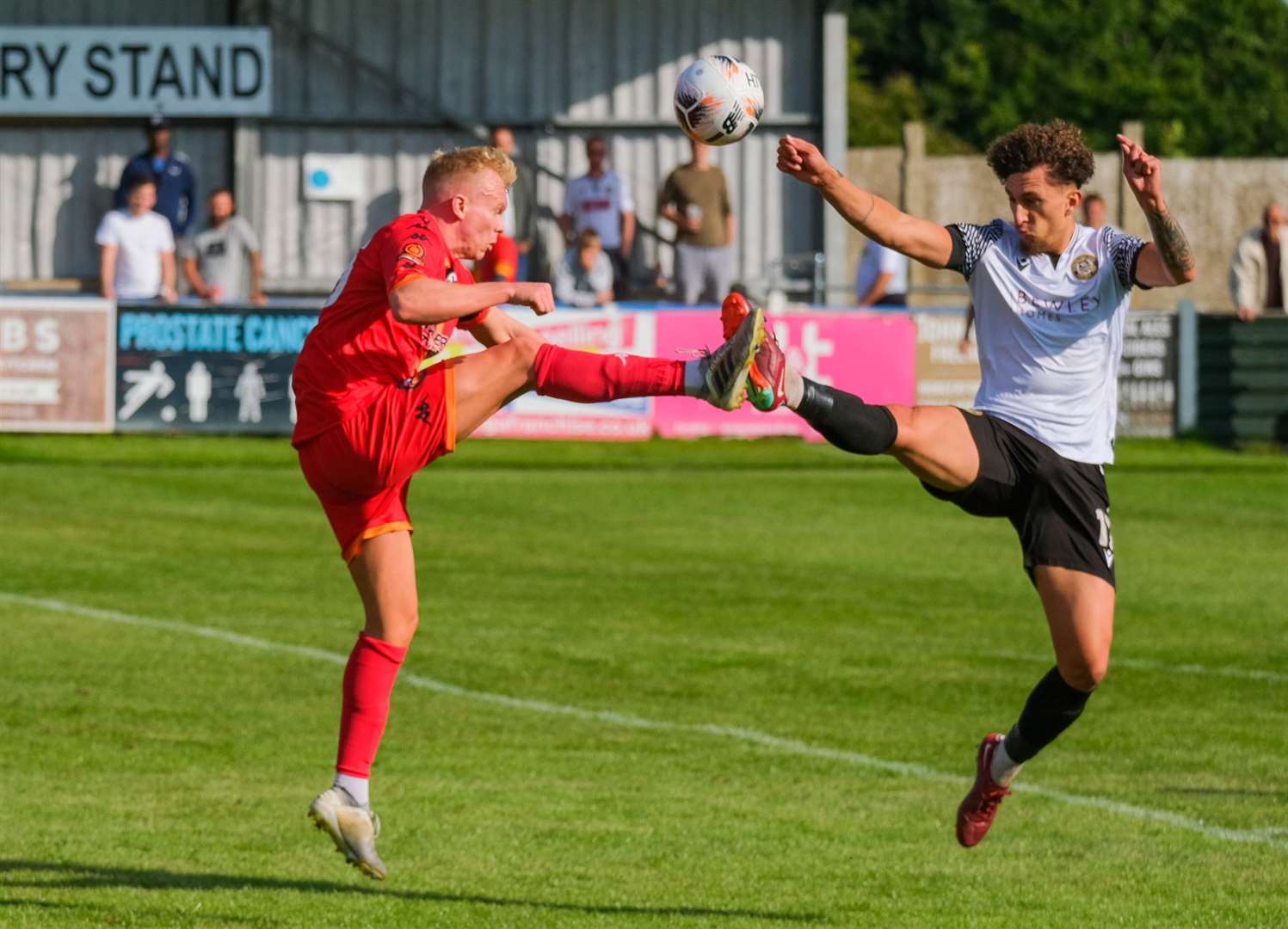 George Smith acrobatically battles for the ball