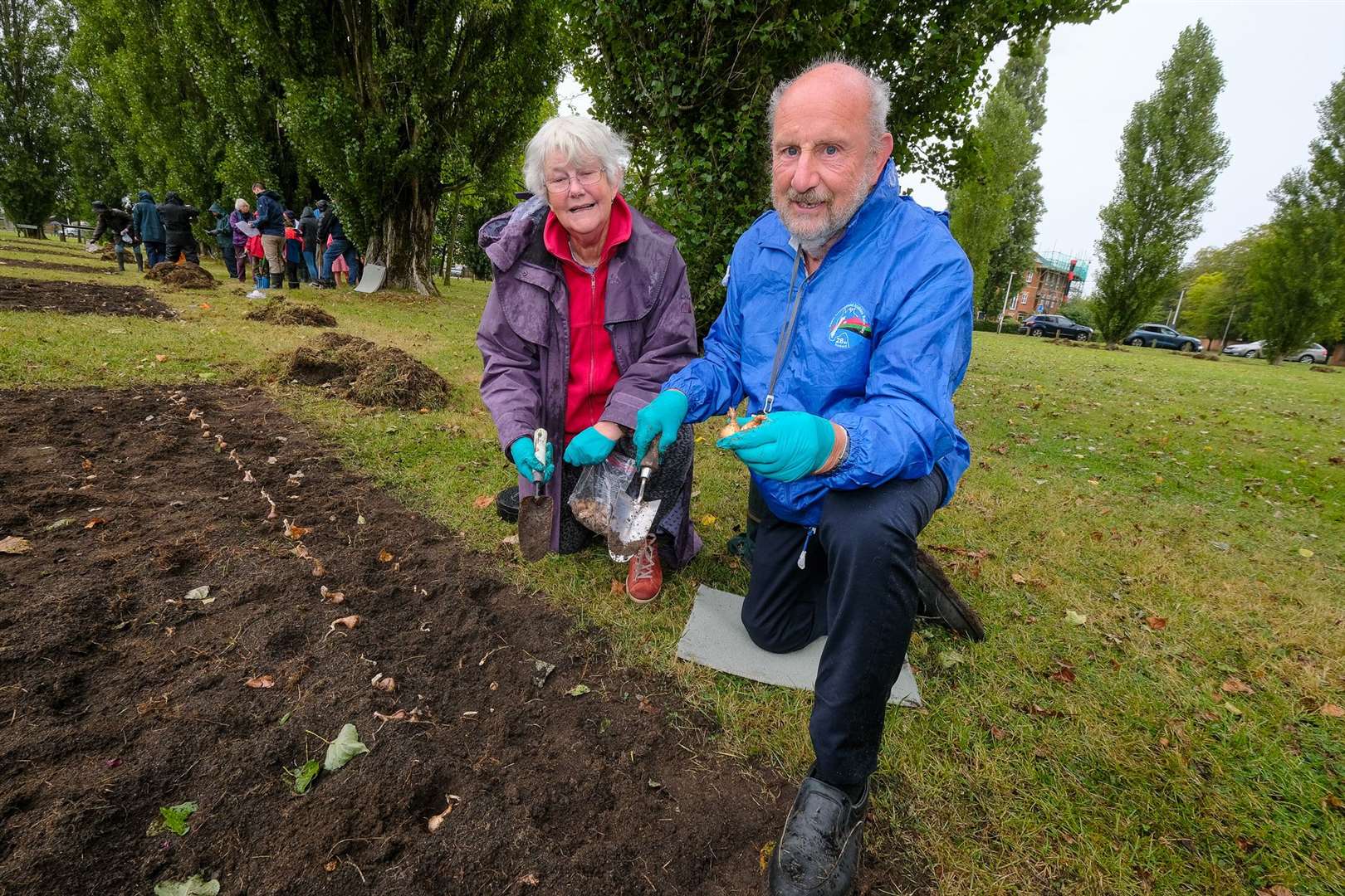 Phil and Vera Barnett lend a hand.