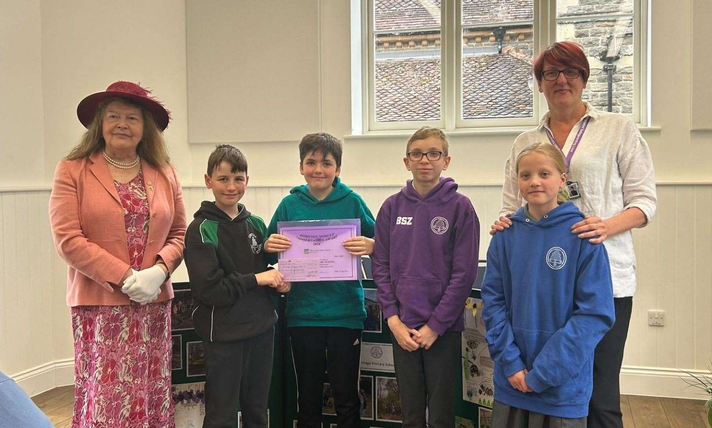 Year 6 pupils Harry, Josh, Bence and Delilah with Headteacher, Jackie Livermore