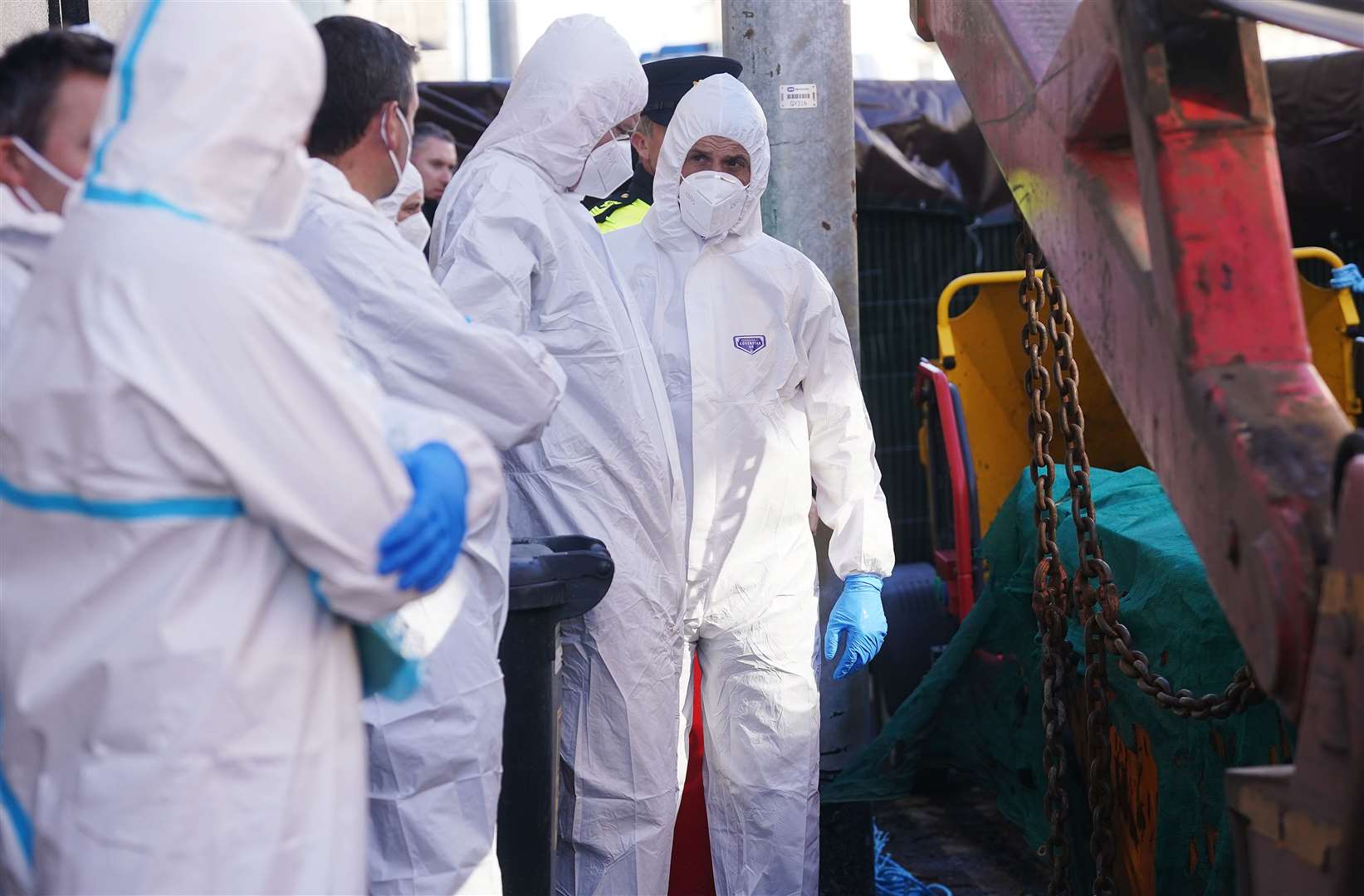 Members of the Garda forensics at the scene in Youghal, Co Cork (Brian Lawless/PA)
