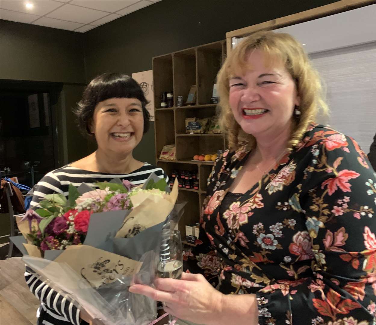 Nicola Chester receives a bouquet from her editor Muna Reyal
