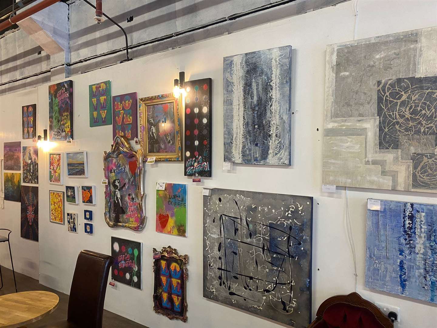 Artwork created by local artists adorns the walls