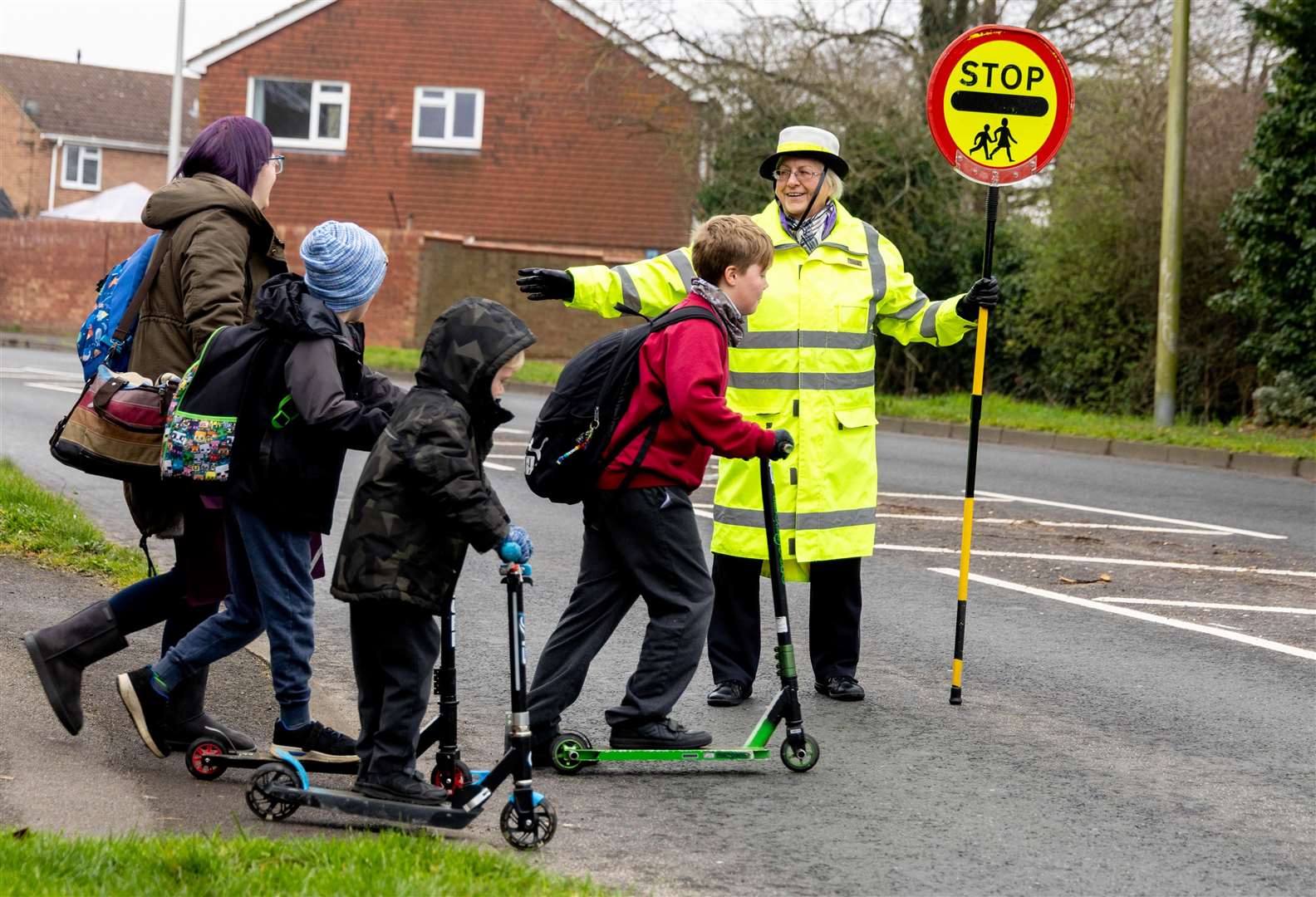 Jenny helping children to cross the road safely