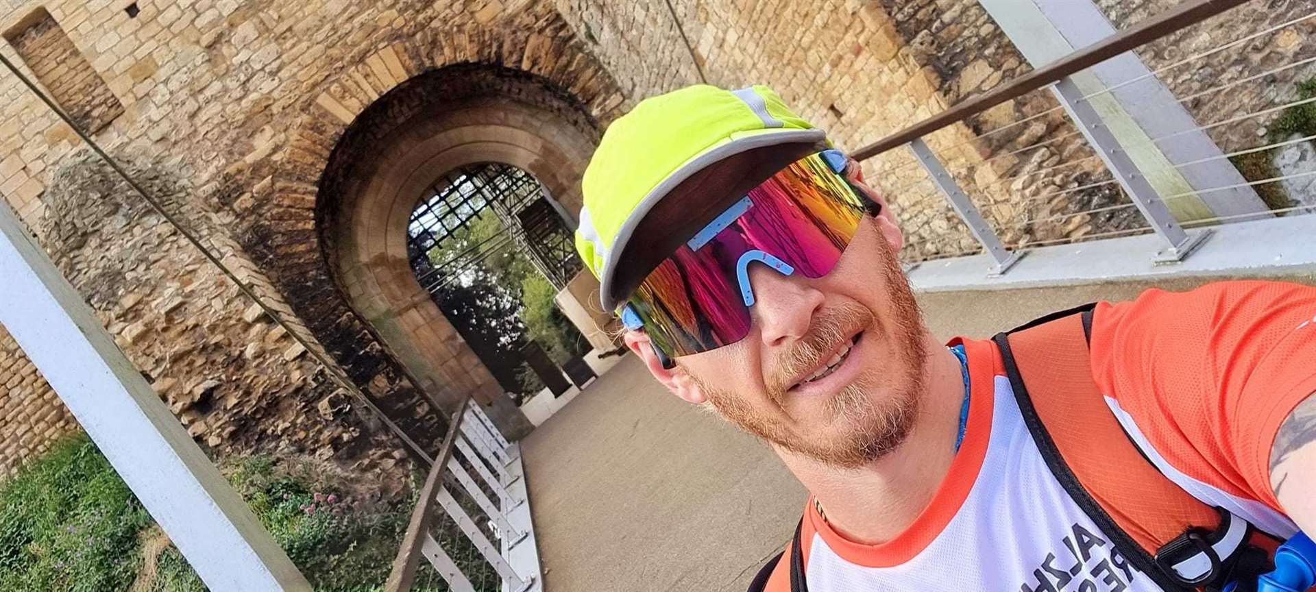 Newbury charity runner Greg Watson outside Lincoln Castle at the end of his challenge