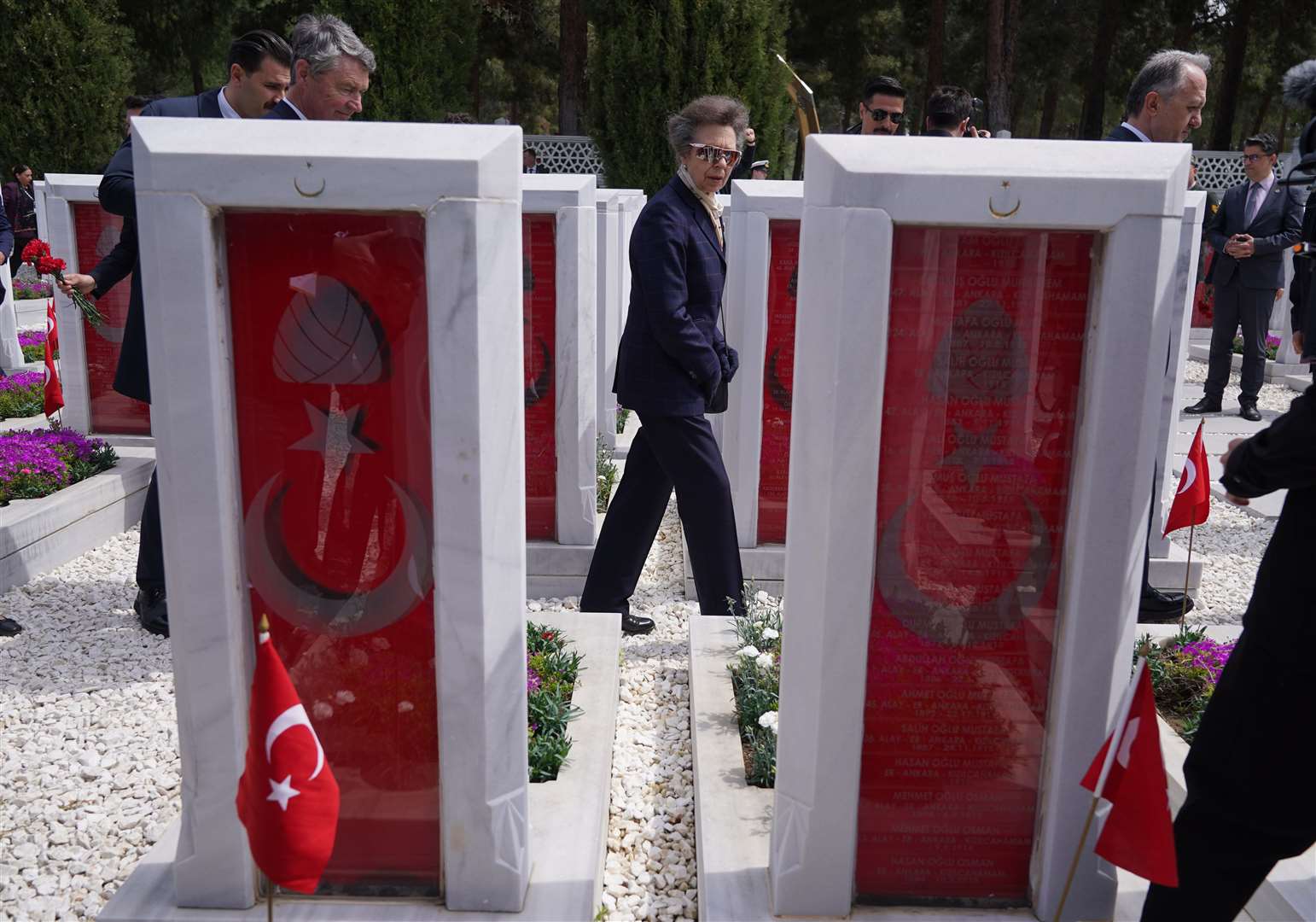 The Princess Royal walks beside the graves of Turkish soldiers in the Gallipoli Peninsula Historical National Park (Yui Mok/PA)