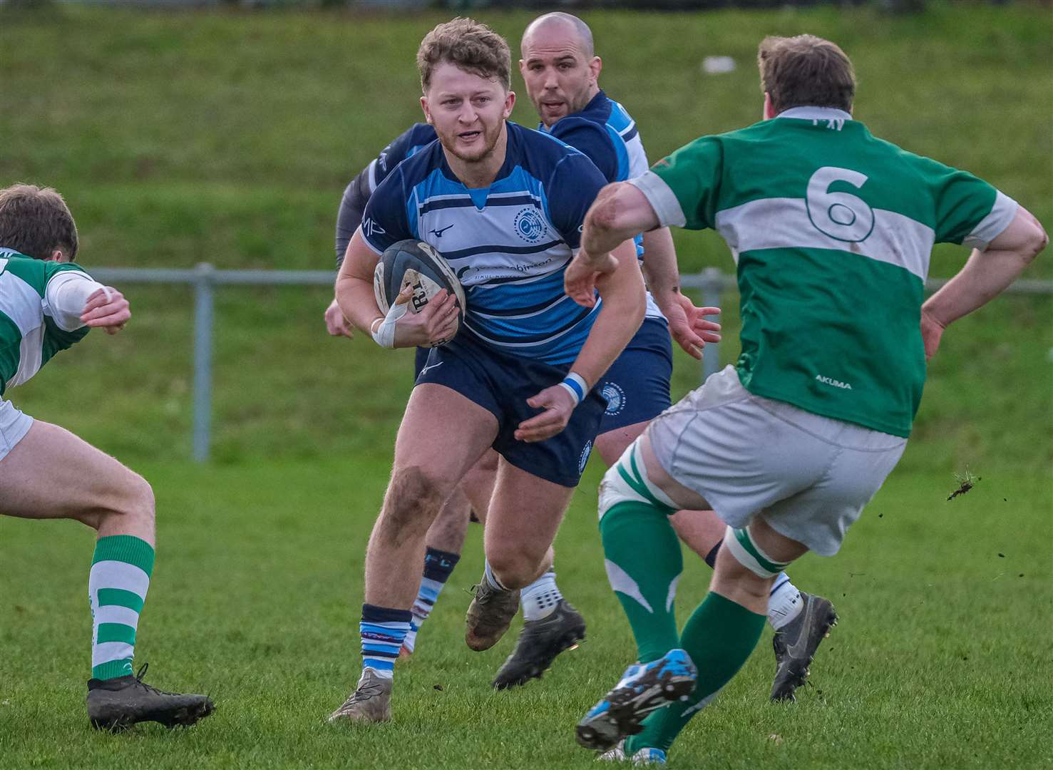 Ali Magee looks for a gap in the Salisbury defence