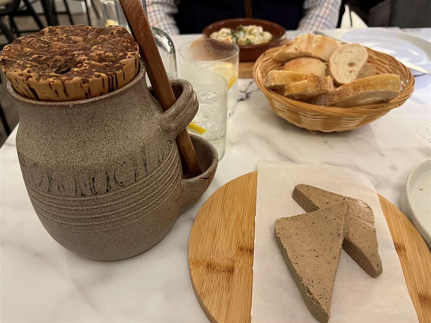 The stone jar with the cornichons for the pate