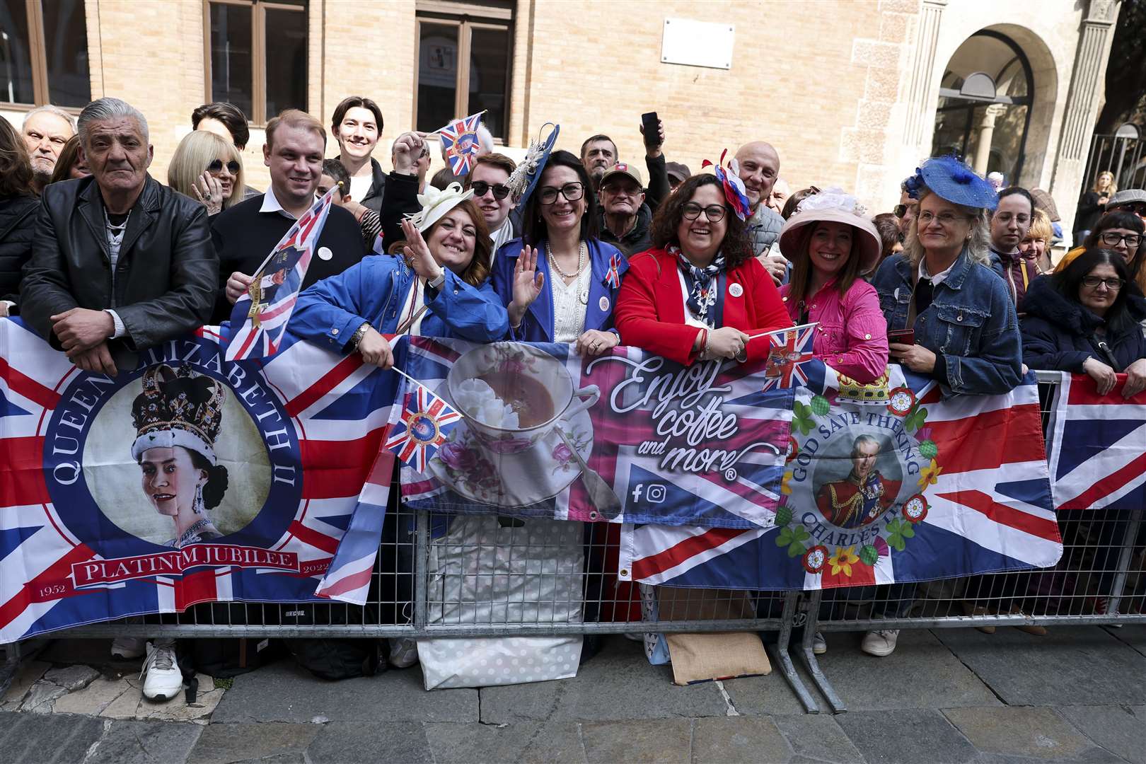 People cheering the arrival of Charles and Camilla (Phil Noble/PA)