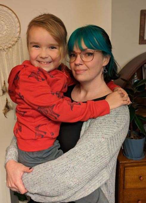 Katy Walklet with her youngest child, Milo