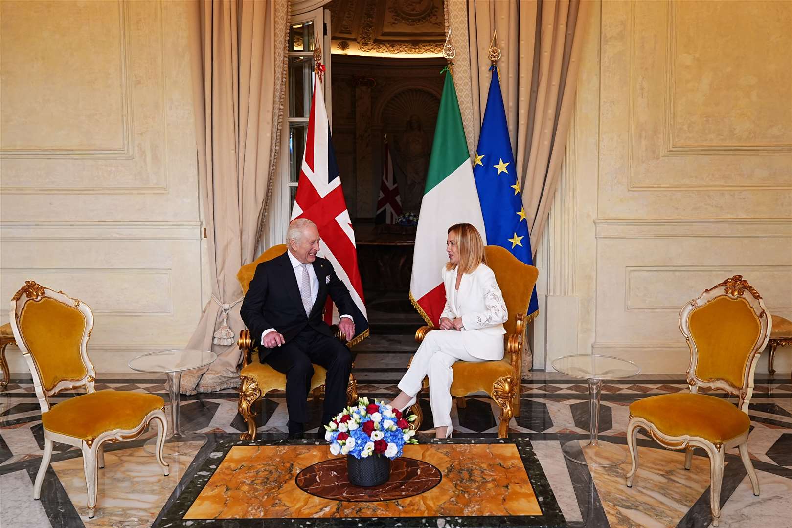Charles talking to Giorgia Meloni at Villa Doria Pamphili in Rome (Aaron Chown/PA)