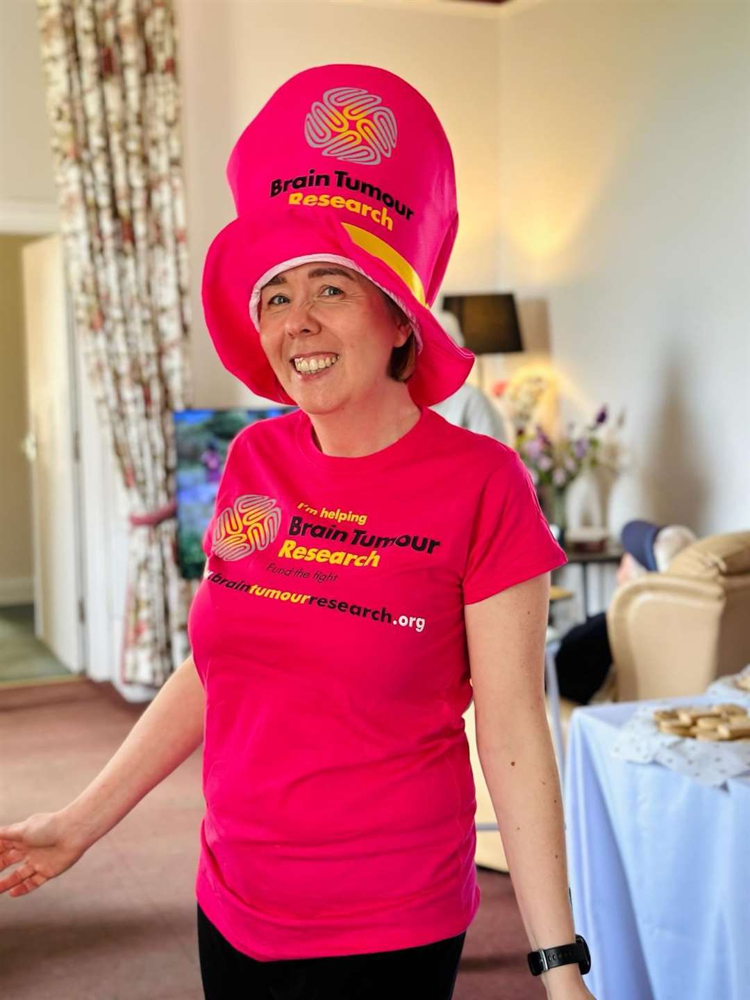 Residents and staff at Enbridge House Care Home in Woolton Hill donned flamboyant hats to raise money for Brain Tumour Research