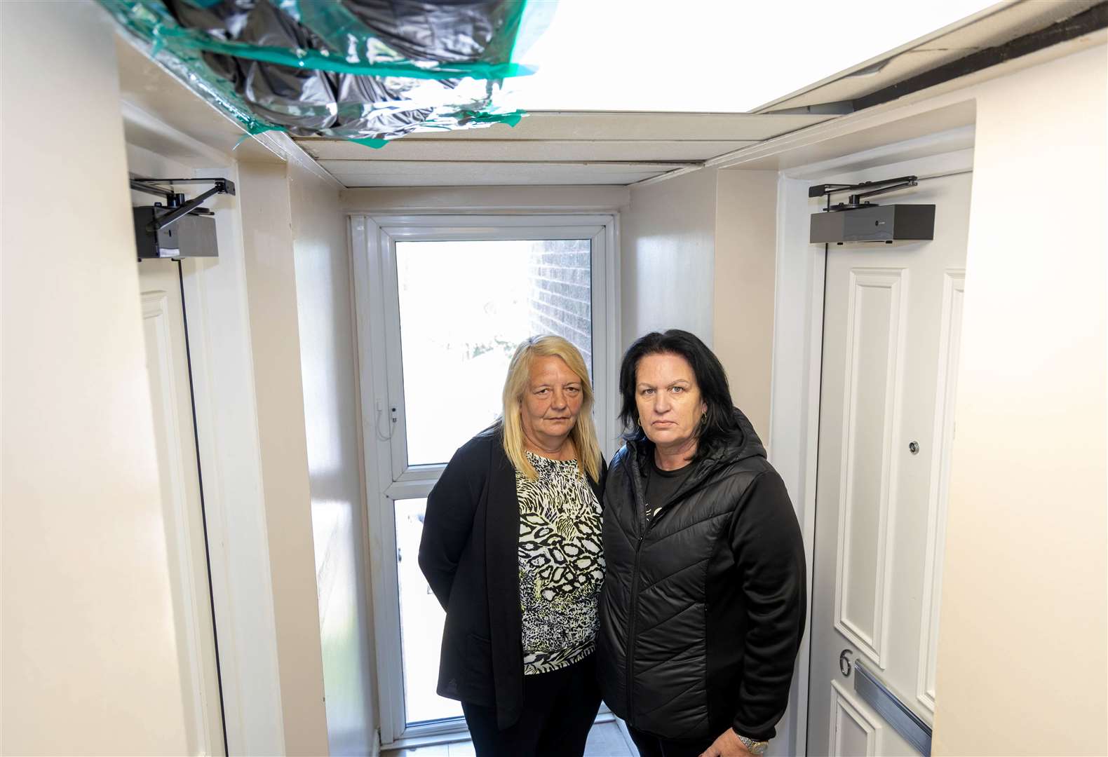 Joanne Stanbrook and Tracey Black in Springhurst House, where ceilings are collapsing due to damp