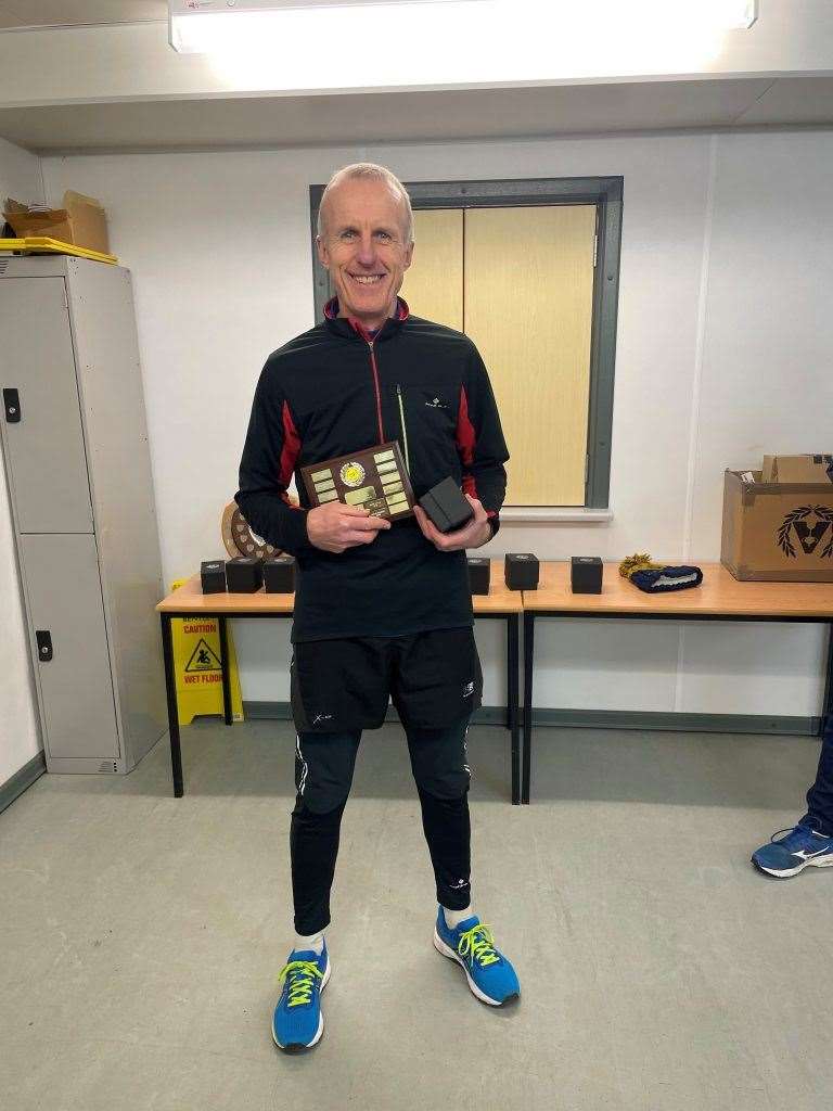 Men's Division Three winner Andy Colling