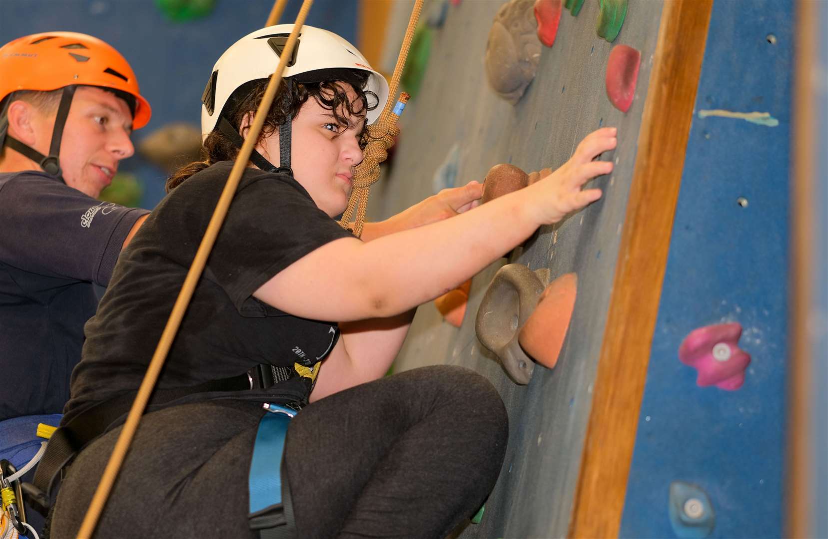 Swings & Smiles using the climbing wall