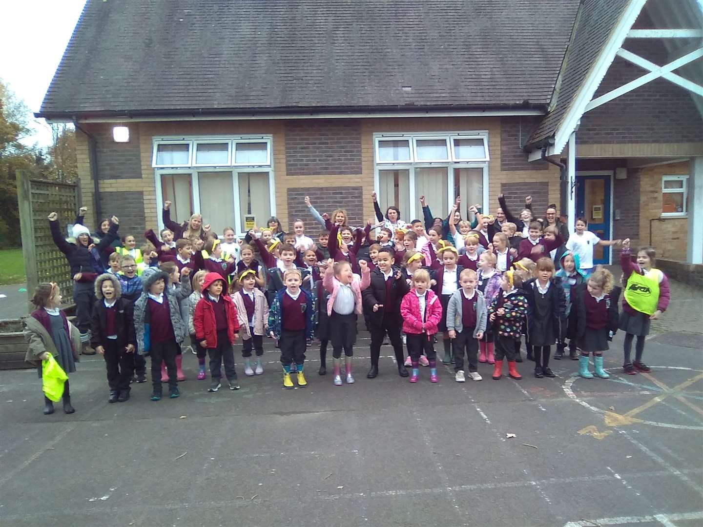 The school celebrates the amount raised. (53532418)