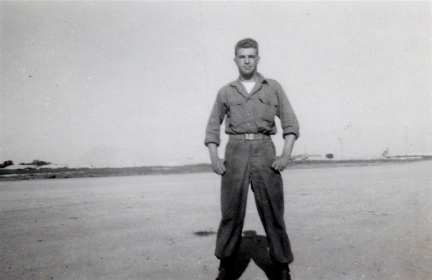 George Tiss standing on the newly finished runway in June 1952