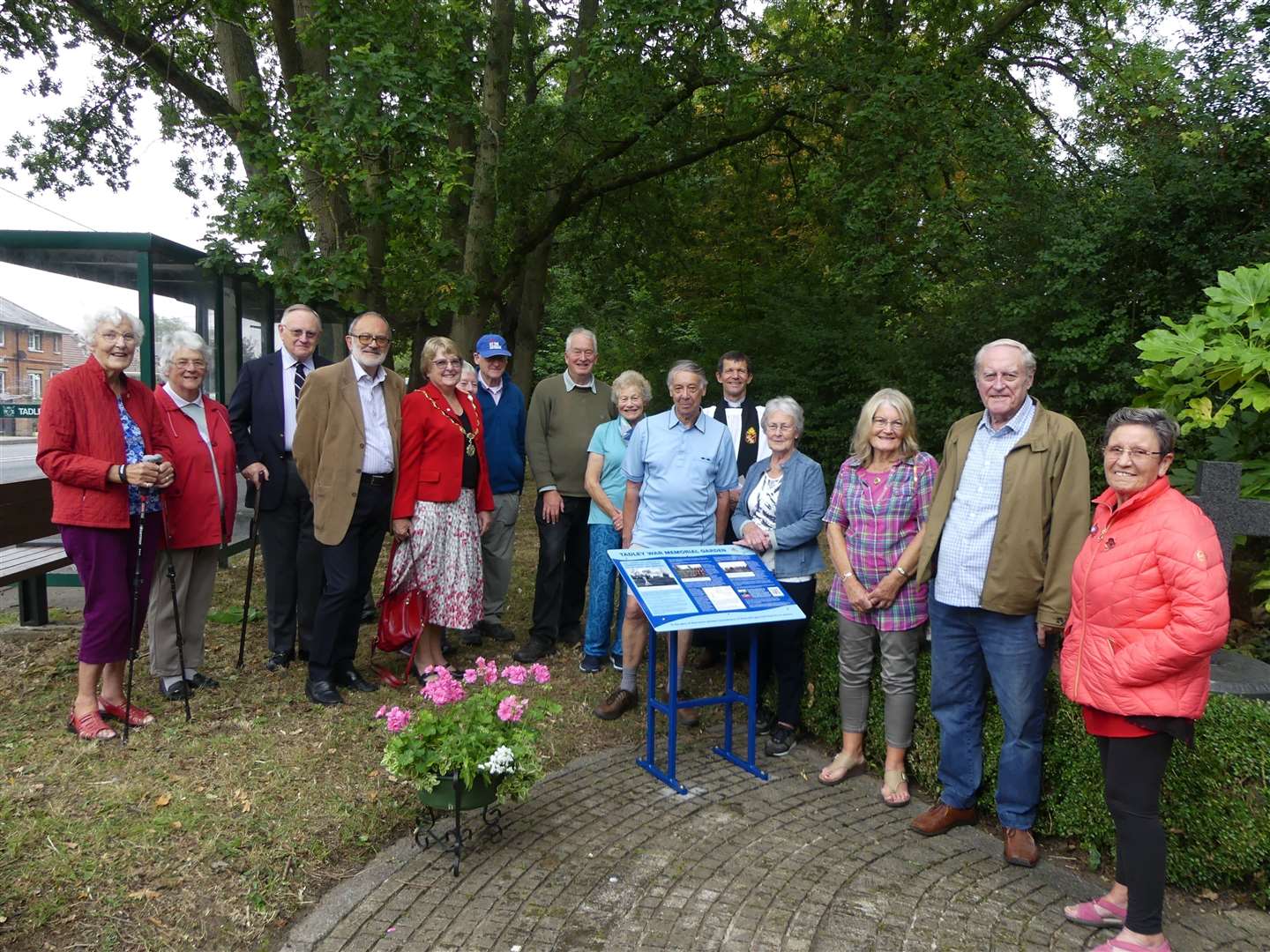 A small group gathered for the unveiling of the board. (51672872)
