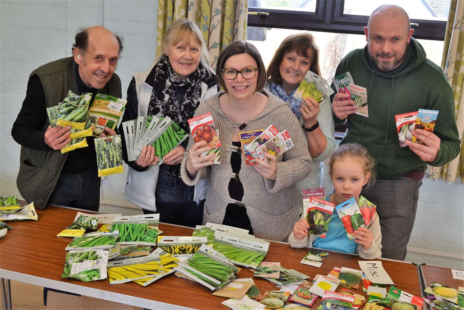 Grahame Collins, Chris Jones, Jane Geater, organiser Kate and John Rickard with their daughter Ivy, 5 at the seed swap
