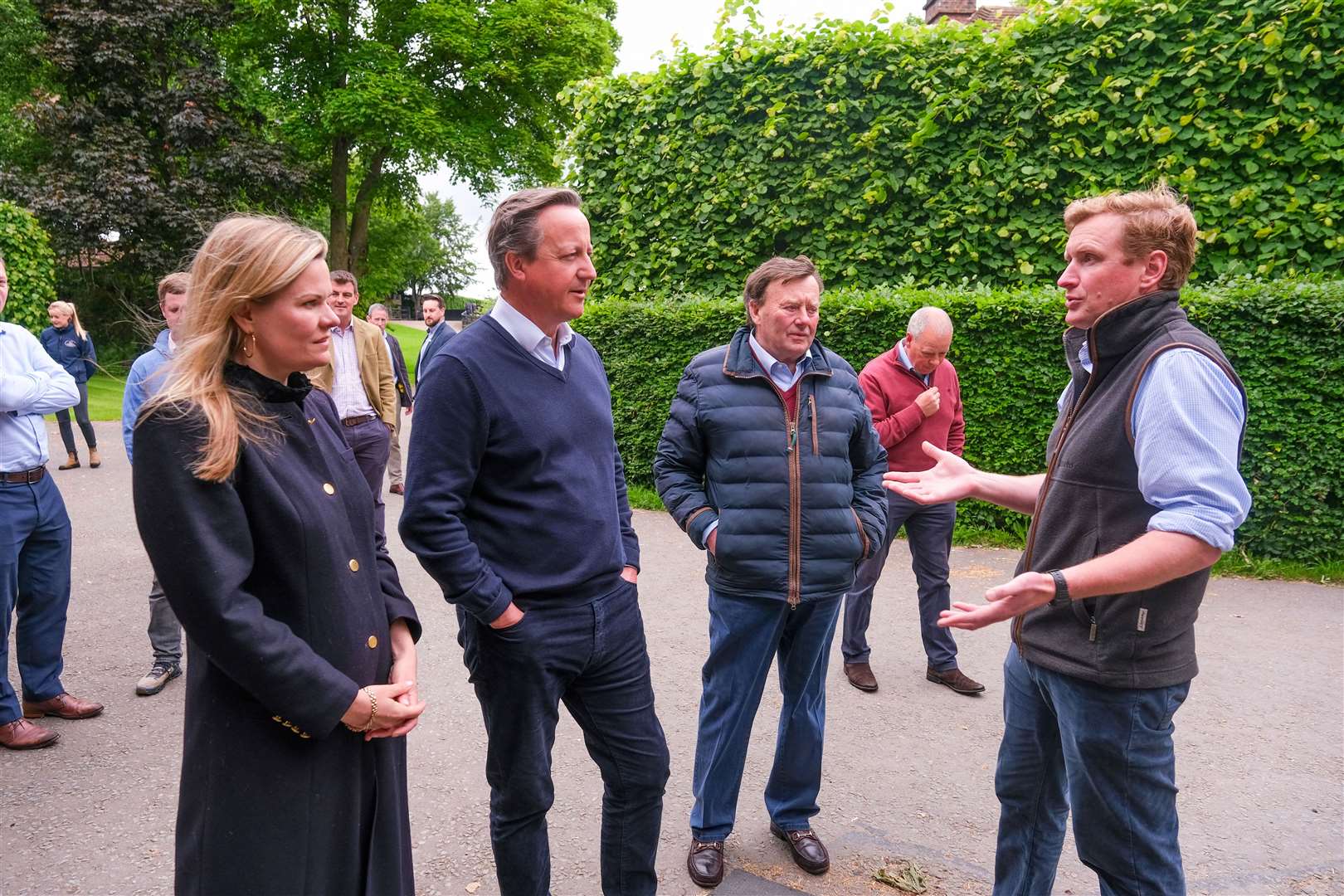 Laura Farris, Lord Cameron, Nicky Henderson and Ed Walker at Ed Walkers Yard in Upper Lambourn