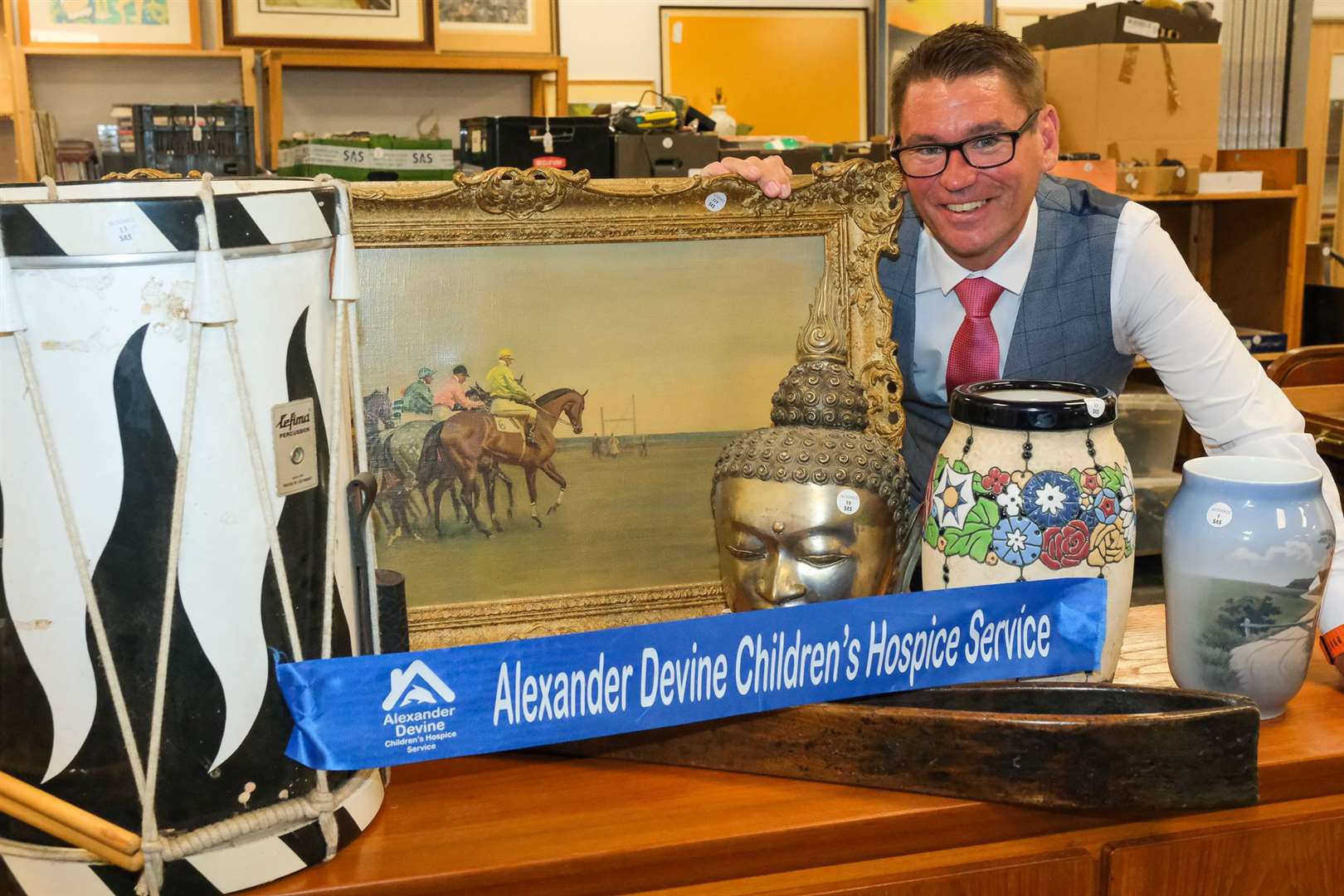 Neil Shuttleworth with some of the lots in the charity auction